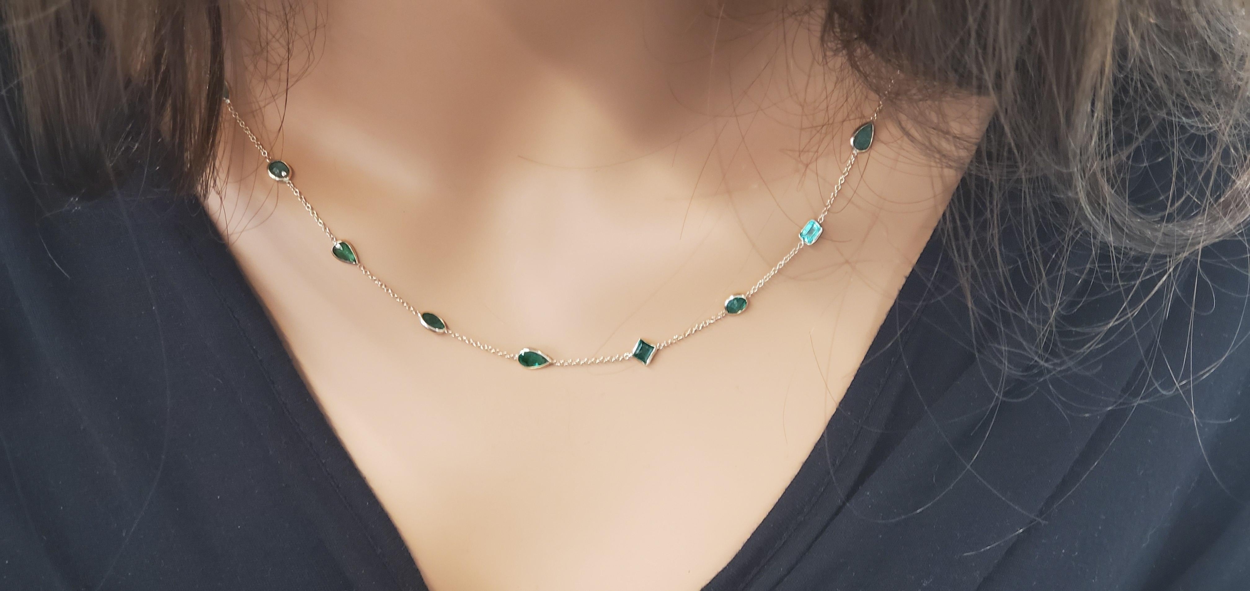 Chic style meets timeless elegance with this brightly polished 14k yellow gold necklace. This whimsical necklace features a total of 34 vibrant emeralds prong set on delicate links giving an effortless look of luxury. This pretty long-length