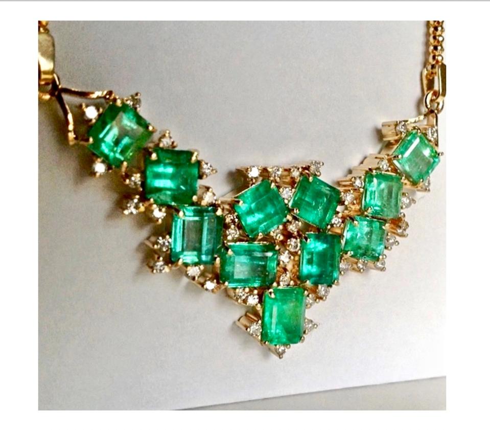 Fantastic Retro Style 14.25 Carat Colombian natural emerald, emerald cut, cluster pendant drop necklace 18K yellow gold handmade setting from our Workshop.
Primary Stones: 100% Natural Colombian Emerald
Shape or Cut : Emerald Cut
Average
