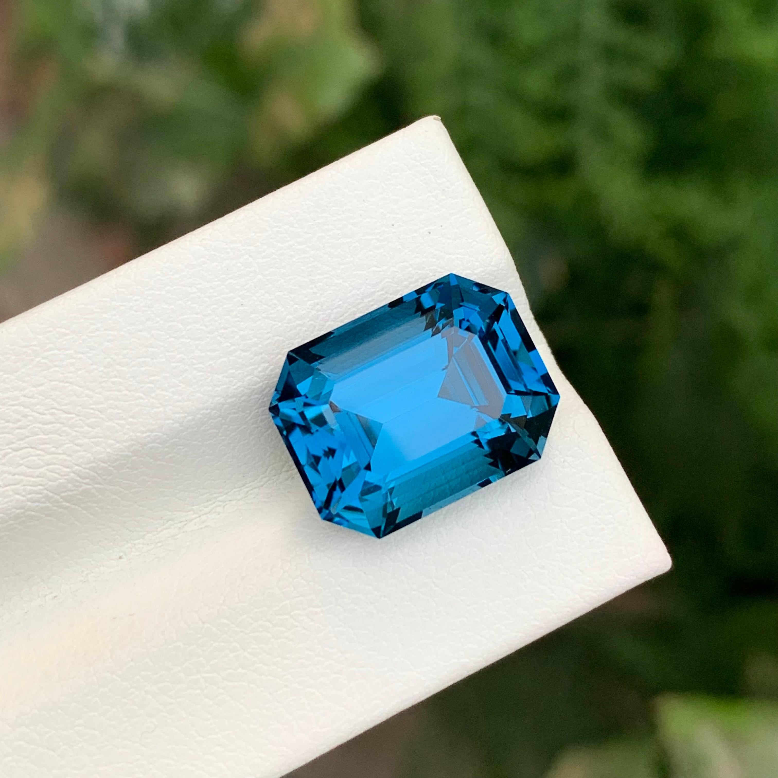 Women's or Men's 14.25 Carat Natural Loose London Blue Topaz Emerald Shape Gem For Sale