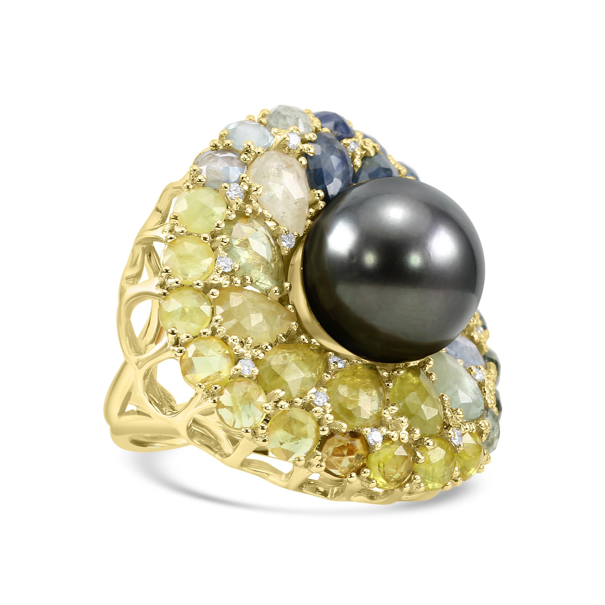 The main showcase of this ring is the stunning Pearl. 

A magnificent 14.25mm Tahitian pearl, showcasing the deep, iridescent hues that are characteristic of this rare and beautiful gemstone. This pearl is a testament to the ocean's beauty and the