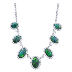 14.27ctw Oval Opal and 6.37ctw Diamond Halo 18kt White Gold Necklace