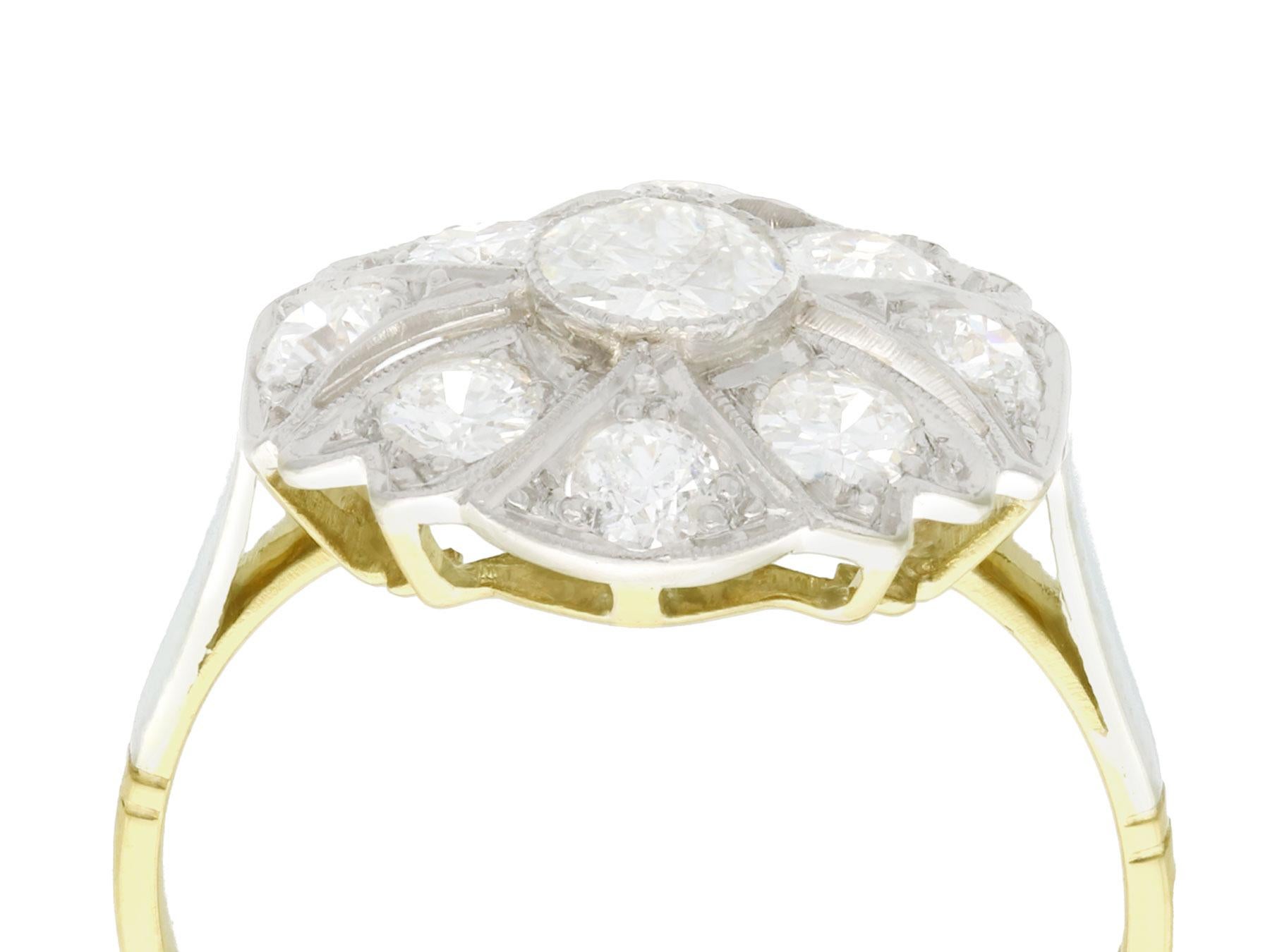 A stunning, fine and impressive antique Art Deco 1.42 carat diamond and 18 karat yellow gold, platinum set dress ring; part of our diverse antique estate jewelry collections.

This stunning, fine and impressive 1920s diamond ring has been crafted in