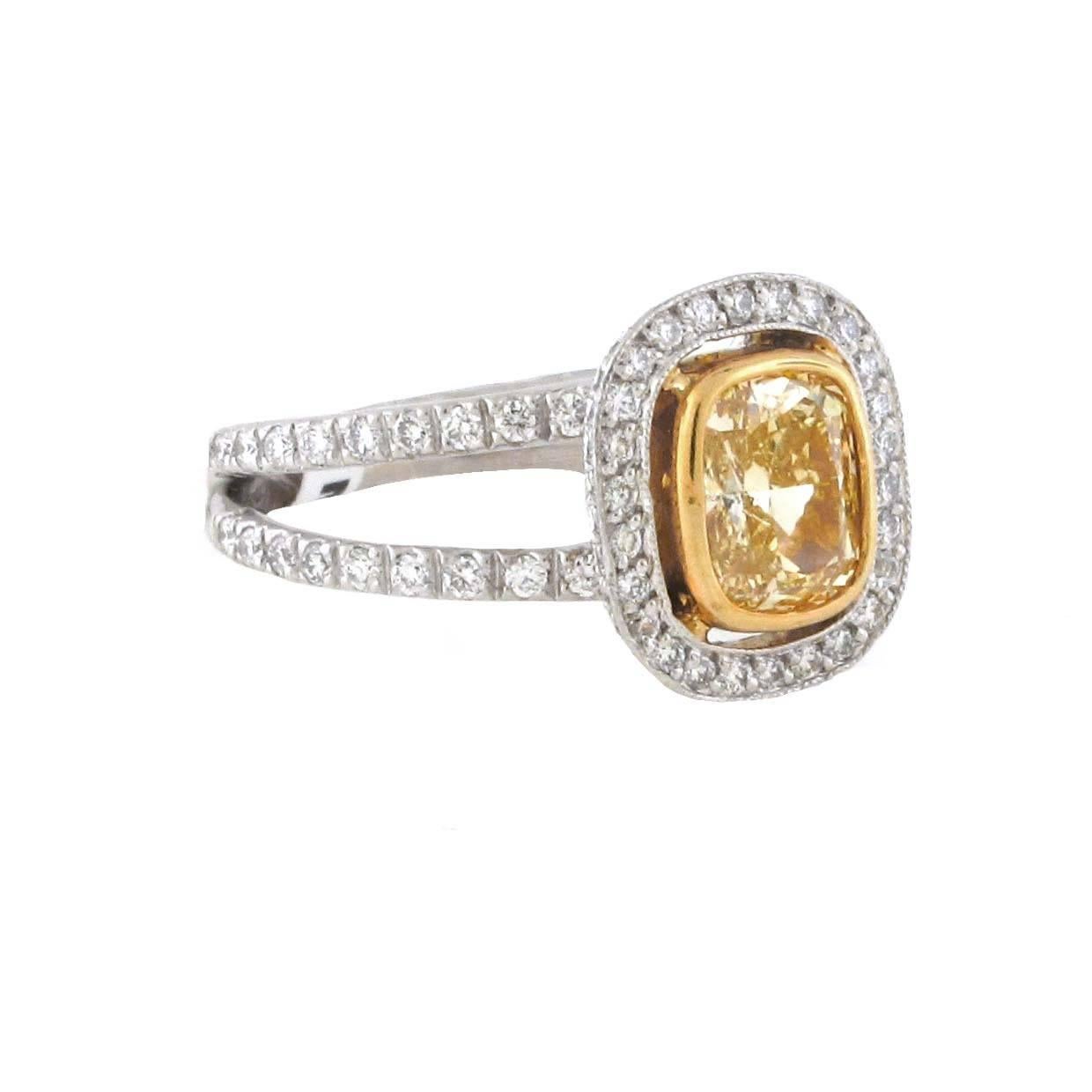 This 1.42 ct Fancy Intense Yellow Diamond is a super rare ring. Fancy colored diamonds range from light to fancy light to fancy to intense to vivid. This diamond being an intense means it is a true super rich yellow color.  The center stone is