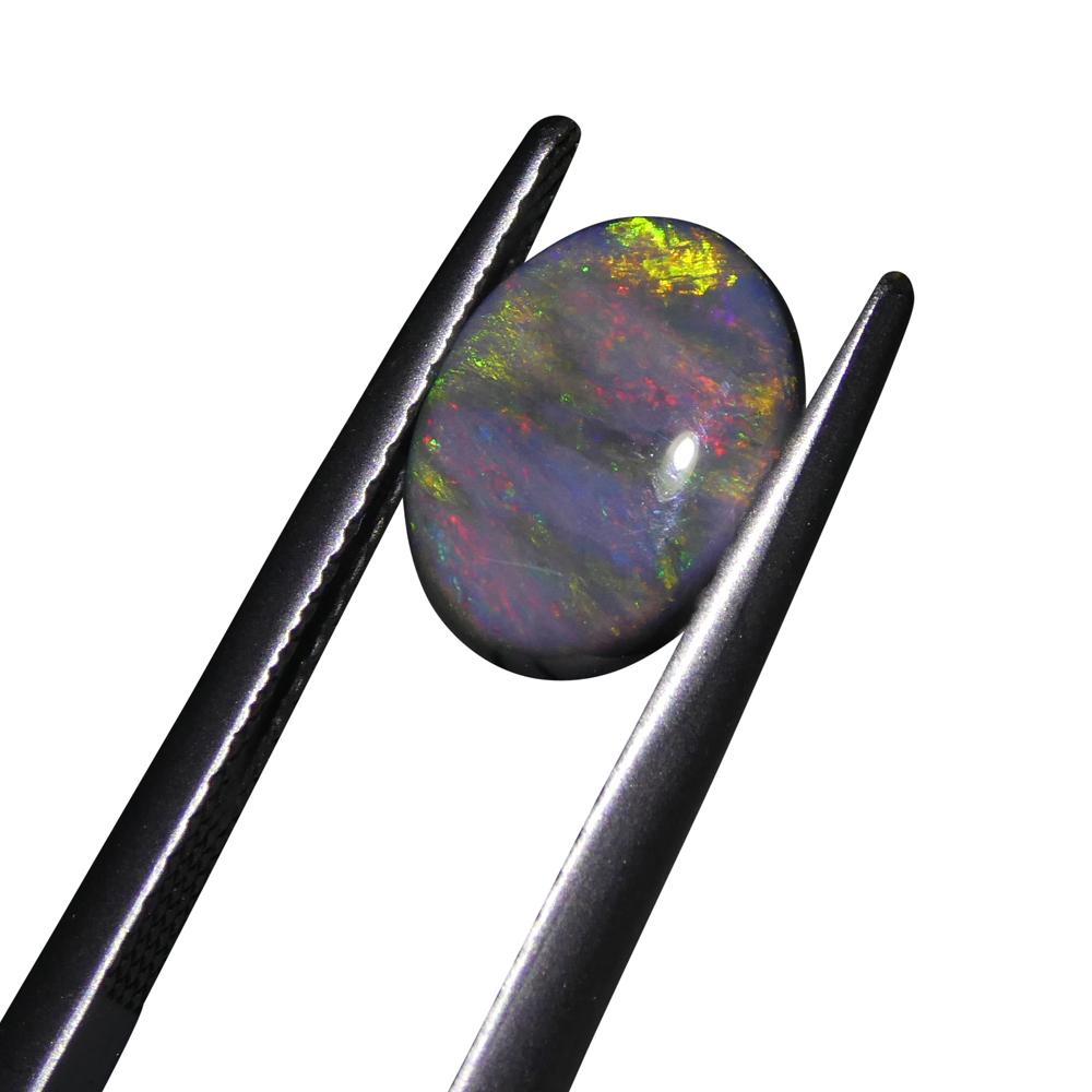 1.42ct Oval Cabochon Black Opal GIA Certified For Sale 2