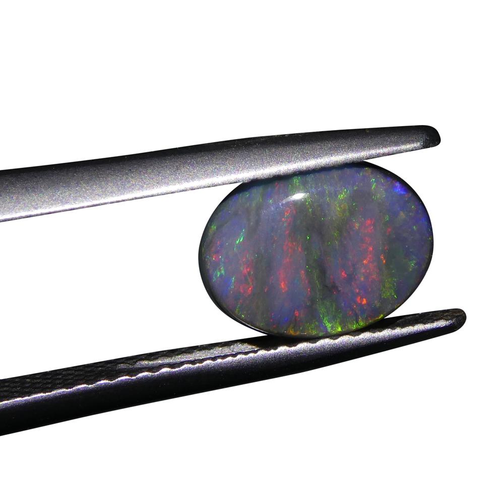 1.42ct Oval Cabochon Black Opal GIA Certified For Sale 3