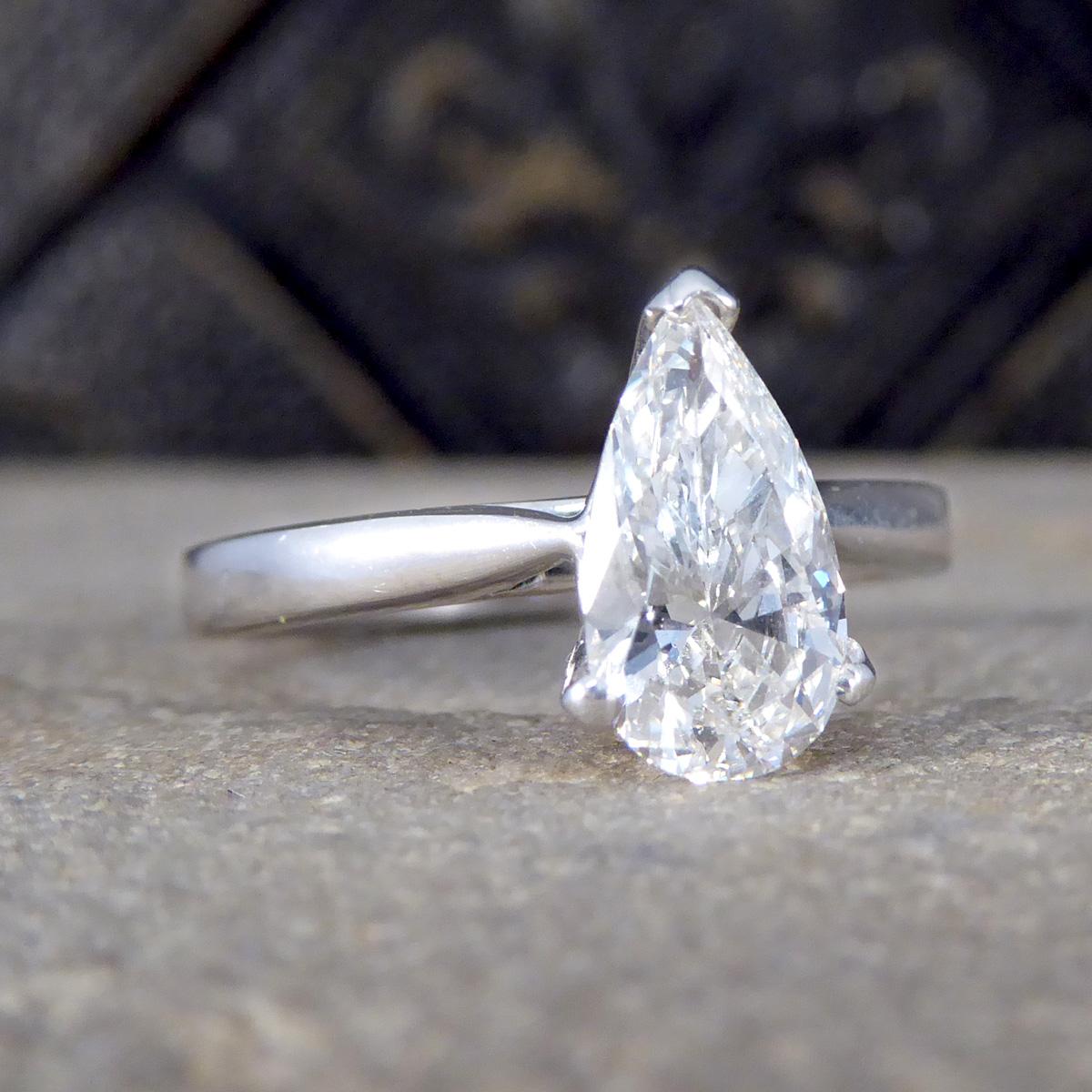 A gorgeous Pear cut Diamond ring. Featuring and clear and bright Pear cut Diamond weighing approximately 1.42ct in a three claw setting. The Diamond itself has a higher grade of colour and clarity assessed as G in colour and VS2 in clarity, allowing