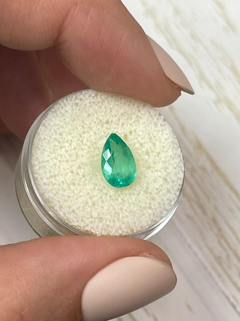 Modern 1.42ct Yellowish Green Colombian Emerald - Pear Cut May Birthstone Gemstone For Sale