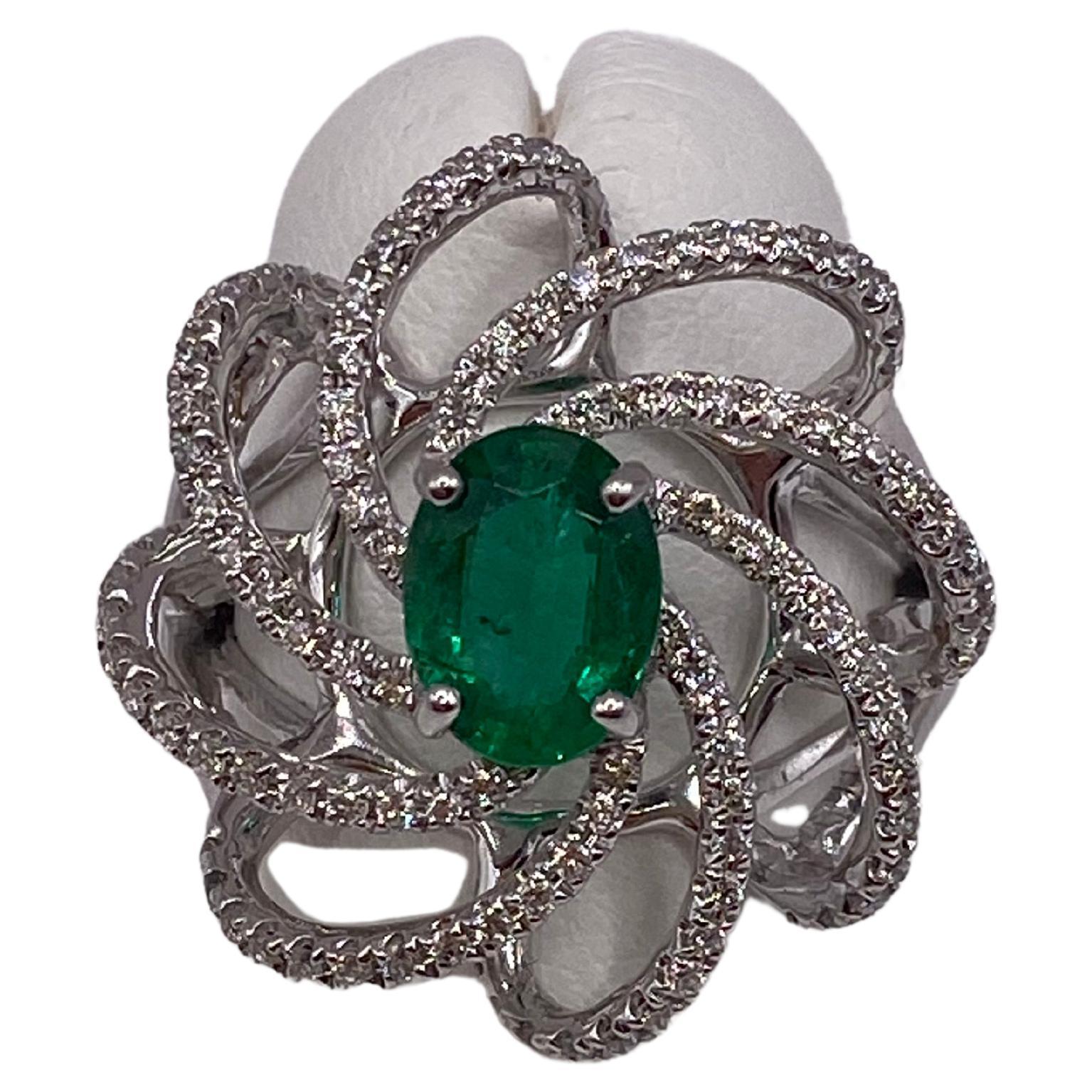 1.42ctw Oval Emerald & Round Diamond Ring in 18KT White Gold For Sale