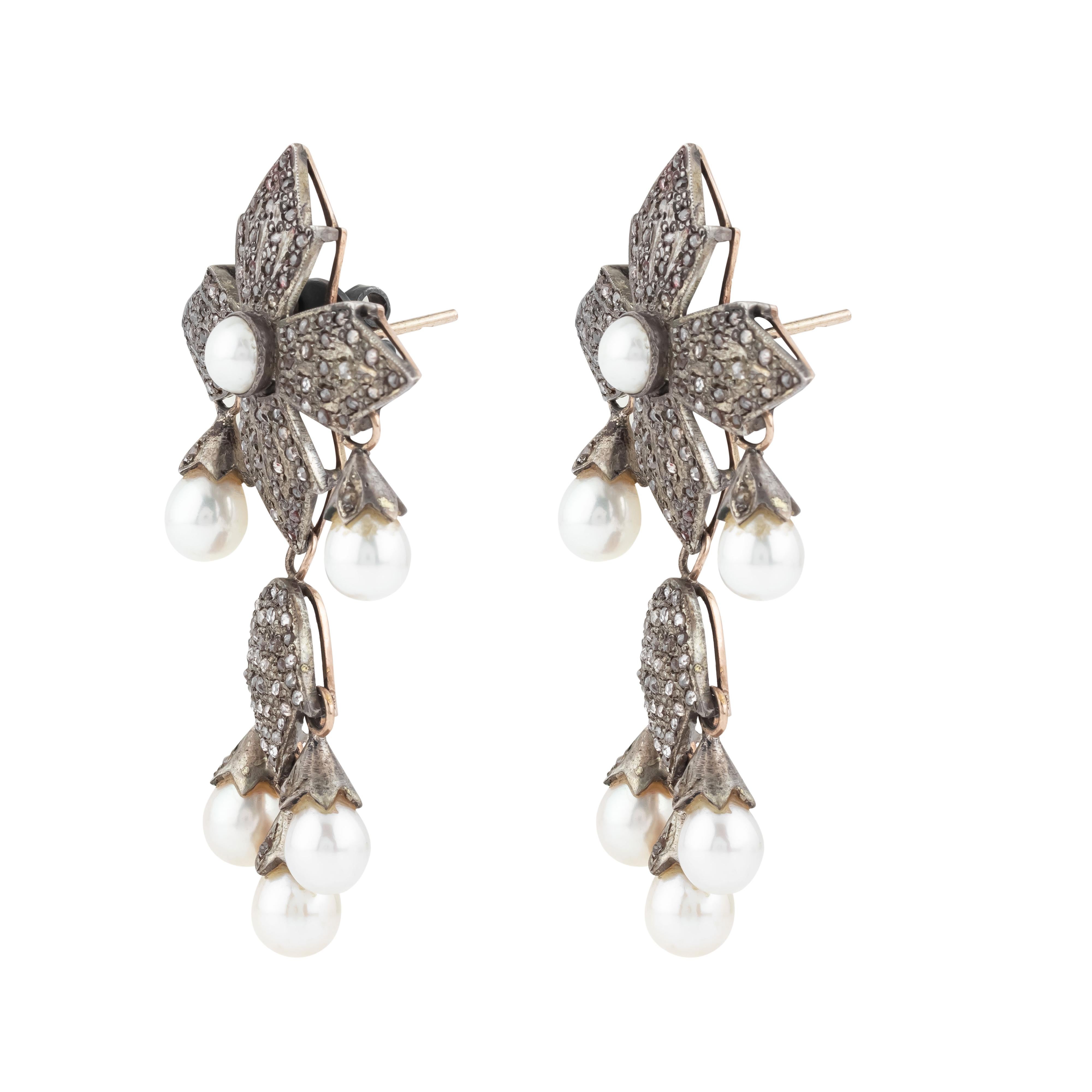 Elevate your elegance with our exquisite 14.3 Carat Diamond and Pearl Dangle Earrings, a captivating fusion of sophistication and timeless beauty. Each earring showcases a meticulously curated design, where luminous pearls gracefully cascade beneath