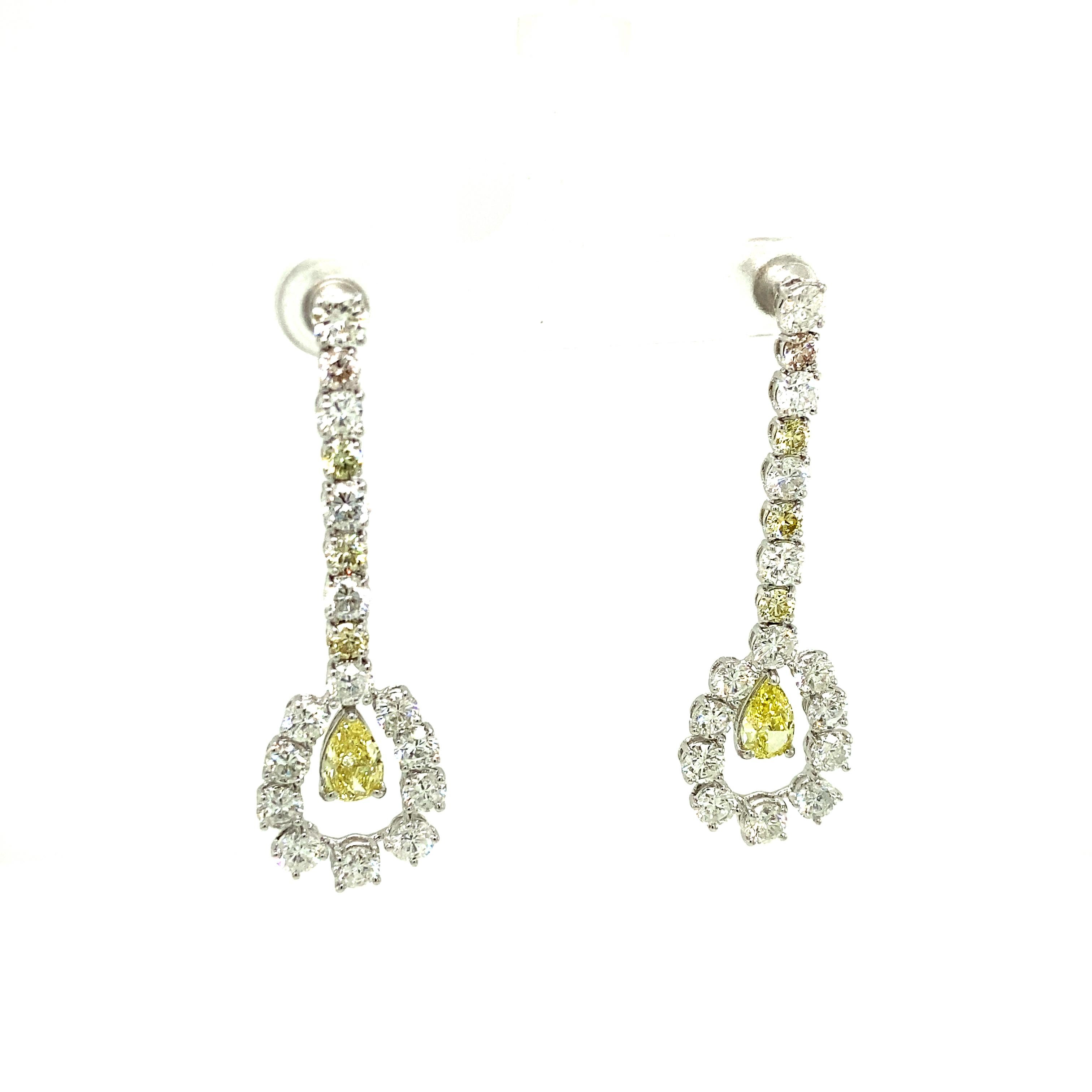 Pear Cut 1.43 Carat GIA Certified Fancy Intense Yellow Diamonds and Diamond Gold Earrings For Sale
