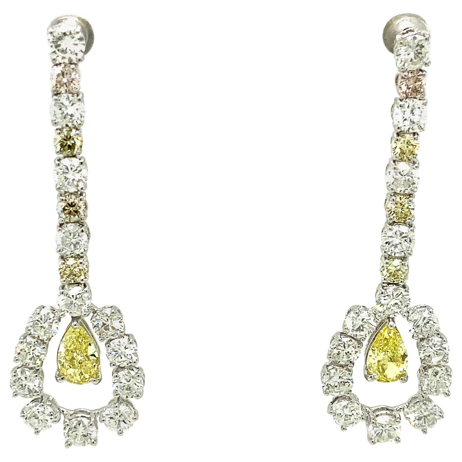 1.43 Carat GIA Certified Fancy Intense Yellow Diamonds and Diamond Gold Earrings