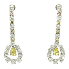 Orecchini in oro con diamanti gialli intensi e diamanti da 1,43 carati certificati GIA