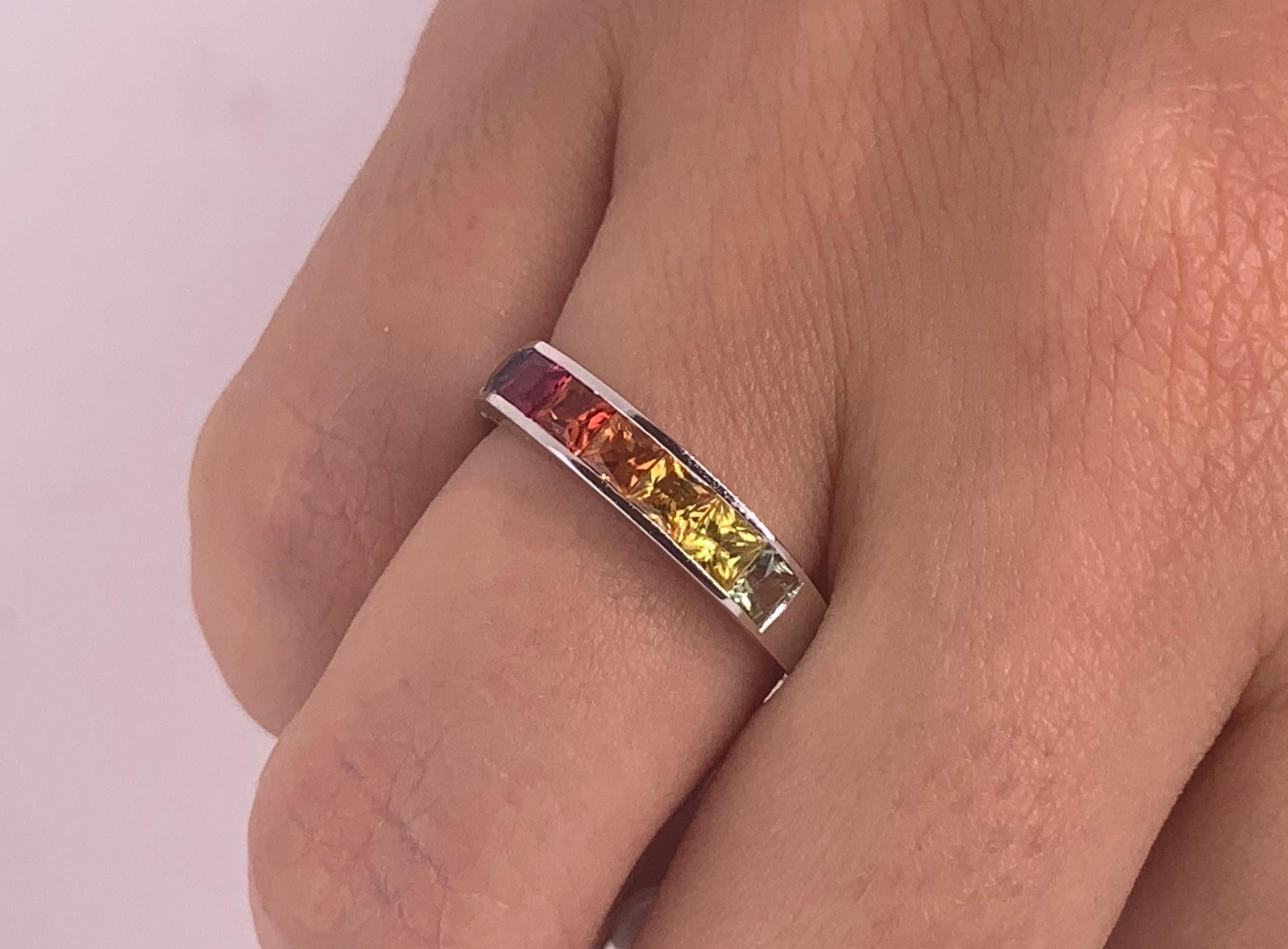 Material: 14k White Gold 
Stone Details:  7 Princess Cut Multicolor Sapphires - at 1.43 Carats - Blue, Pink, Red, Green, Yellow

Alberto offers complimentary sizing on all rings.

Fine one-of-a-kind craftsmanship meets incredible quality in this