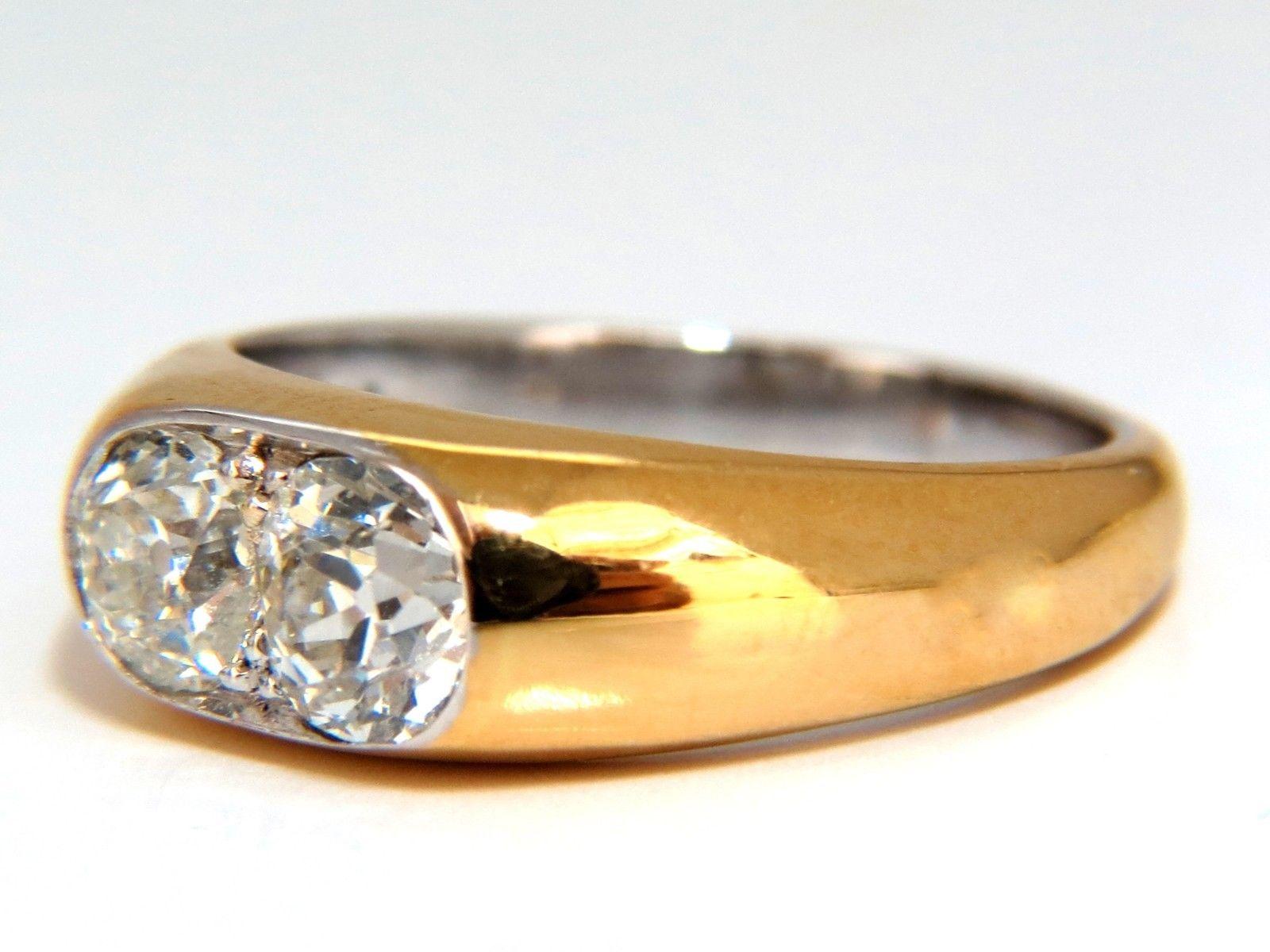 Vintage Revisit Solitaire Twin 
.78 & .65ct. Natural Round brilliant diamond ring. 
Old Mine cut Mounted with graver tools by hand in french pave style. 
Si-1 clarity / J color. 
6.6mm Diameter 
4mm depth 
14kt. yellow gold
5.5 Grams 
Current ring