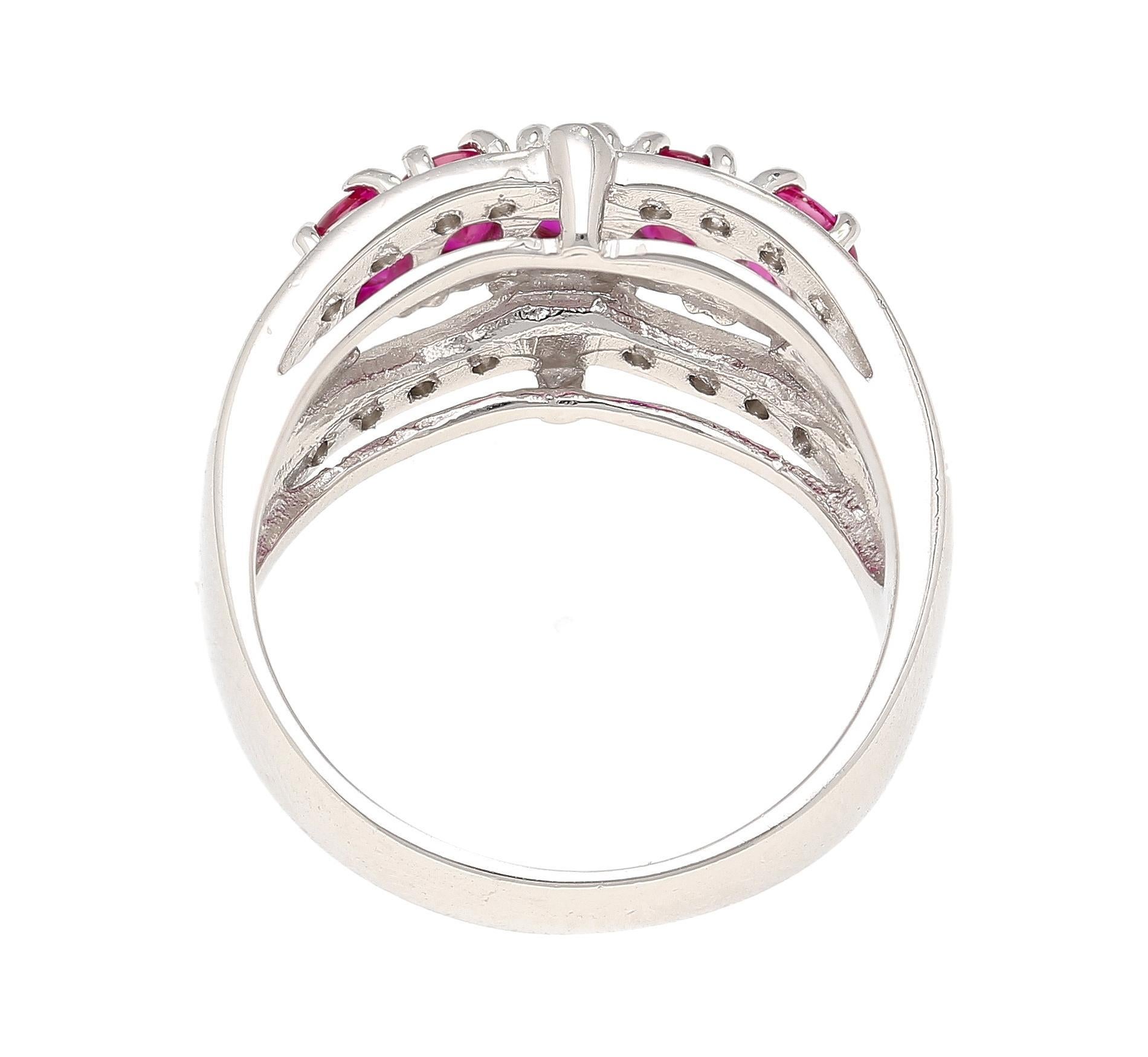 Oval Cut 1.43 Carat Pinkish Red Ruby and Diamond Cluster Platinum Dome Ring For Sale