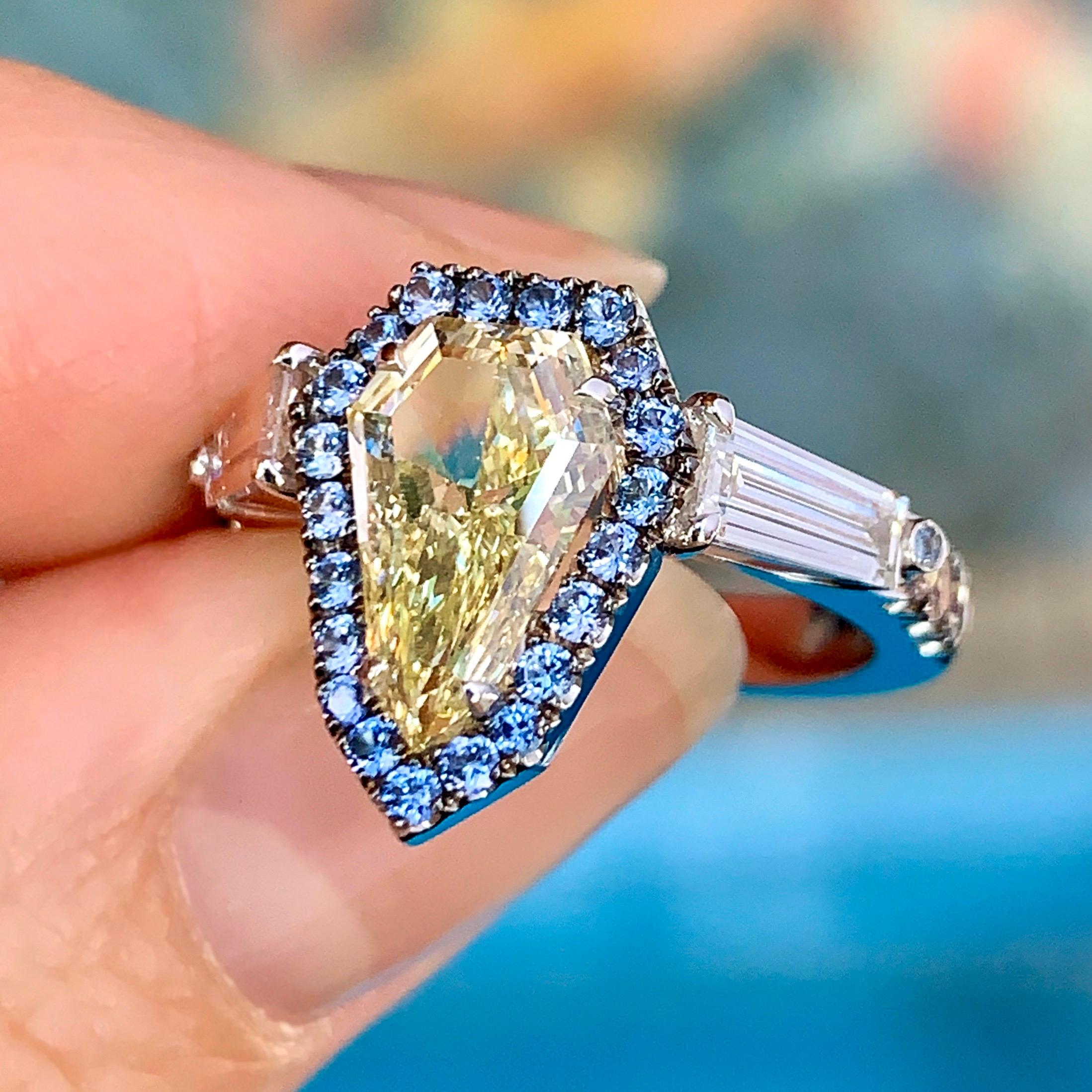1.43 Carat VVS2 GIA Fancy Yellow Shield Cut Diamond, Unheated Blue Sapphire Ring 10
