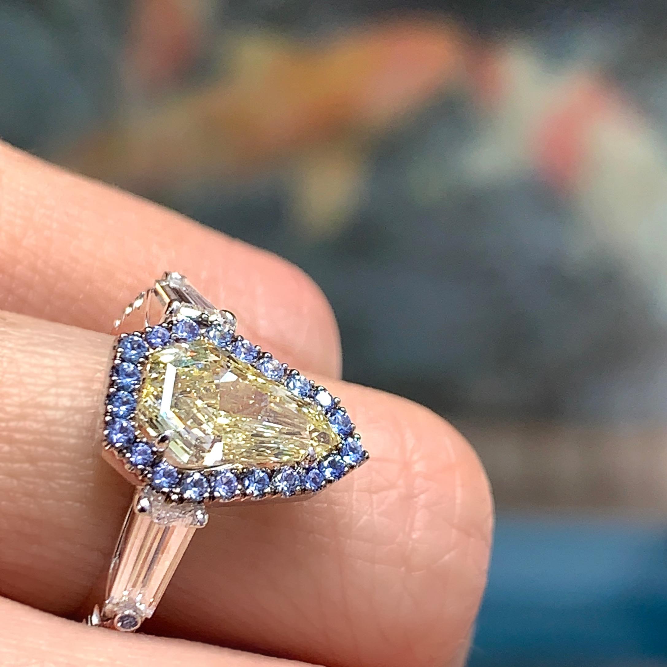 1.43 Carat VVS2 GIA Fancy Yellow Shield Cut Diamond, Unheated Blue Sapphire Ring 11
