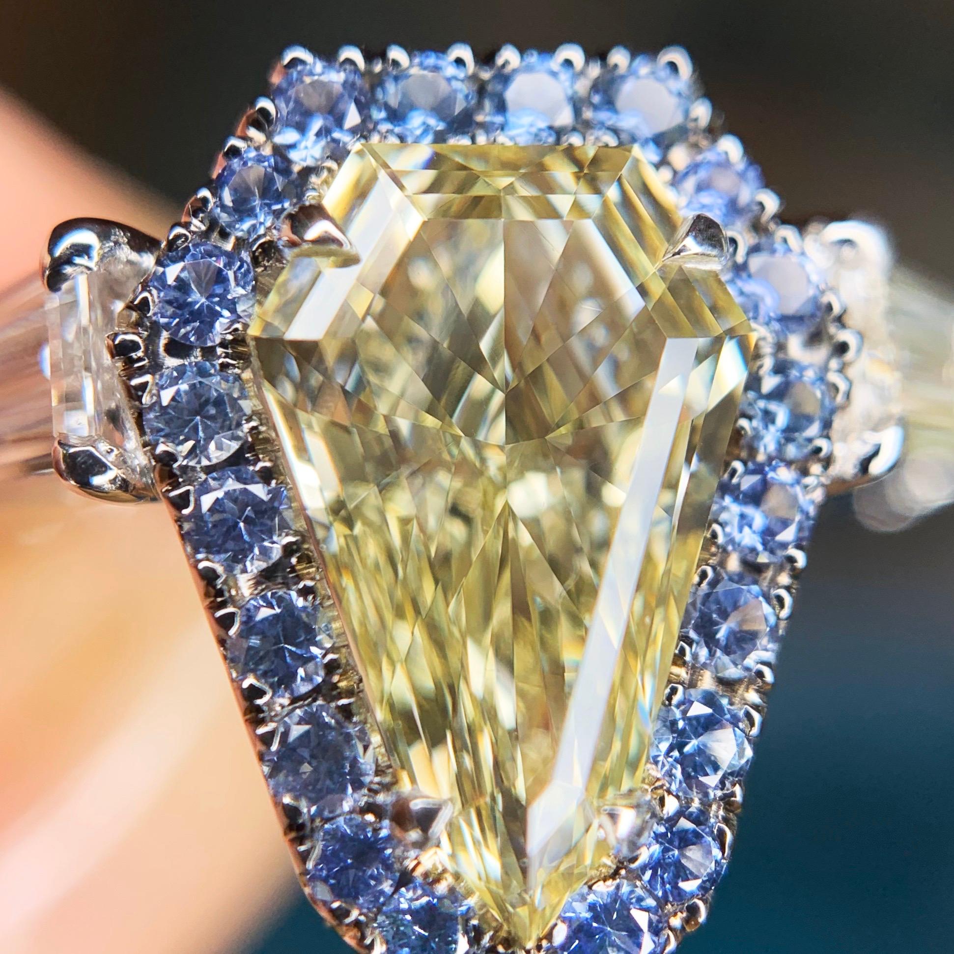1.43 Carat VVS2 GIA Fancy Yellow Shield Cut Diamond, Unheated Blue Sapphire Ring 12