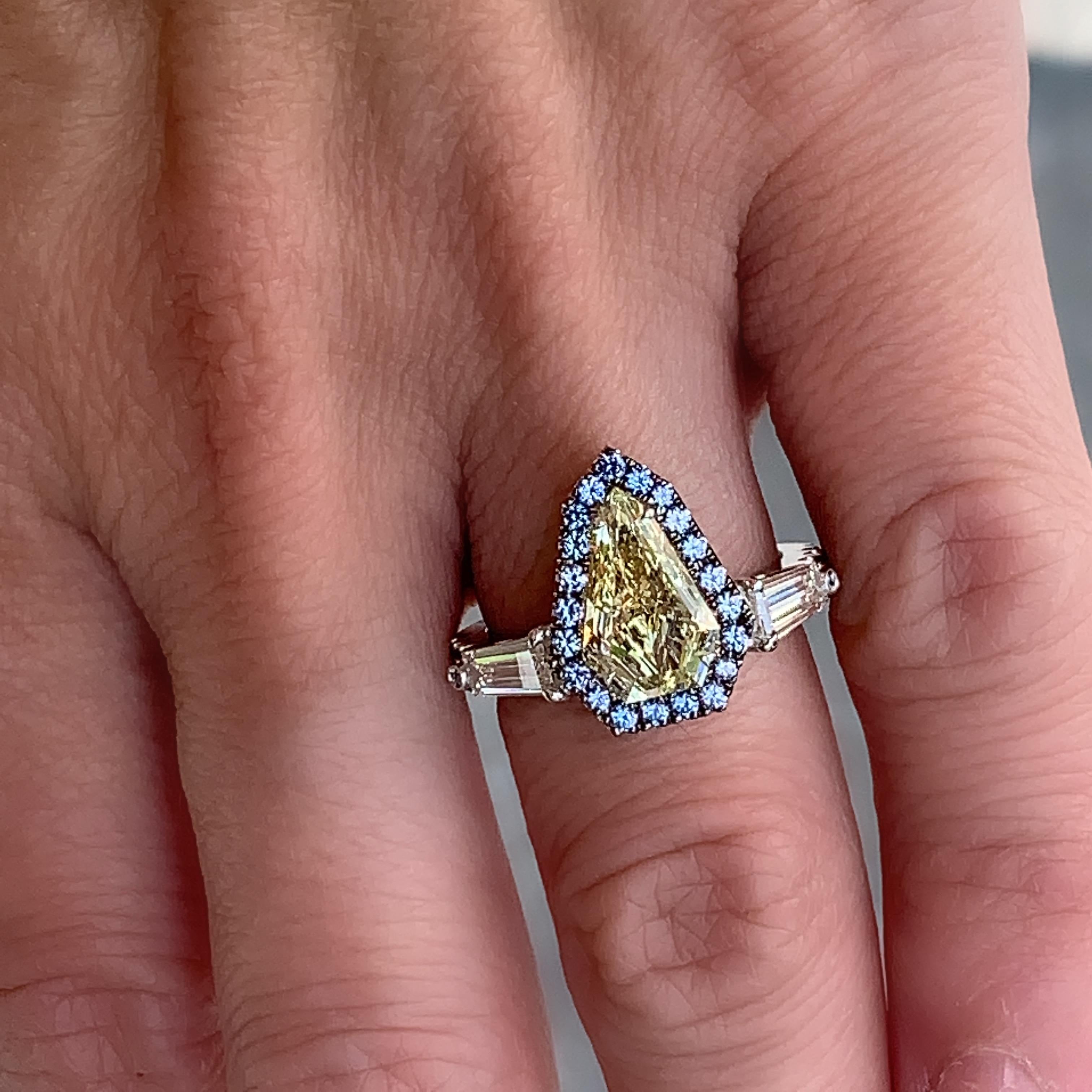 1.43 Carat VVS2 GIA Fancy Yellow Shield Cut Diamond, Unheated Blue Sapphire Ring 4