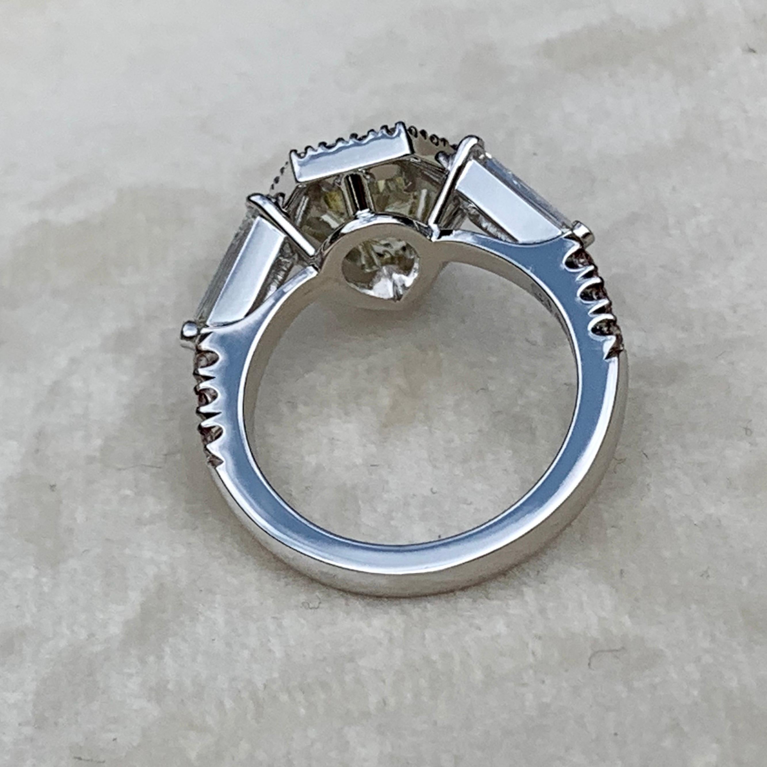 Women's 1.43 Carat VVS2 GIA Fancy Yellow Shield Cut Diamond, Unheated Blue Sapphire Ring