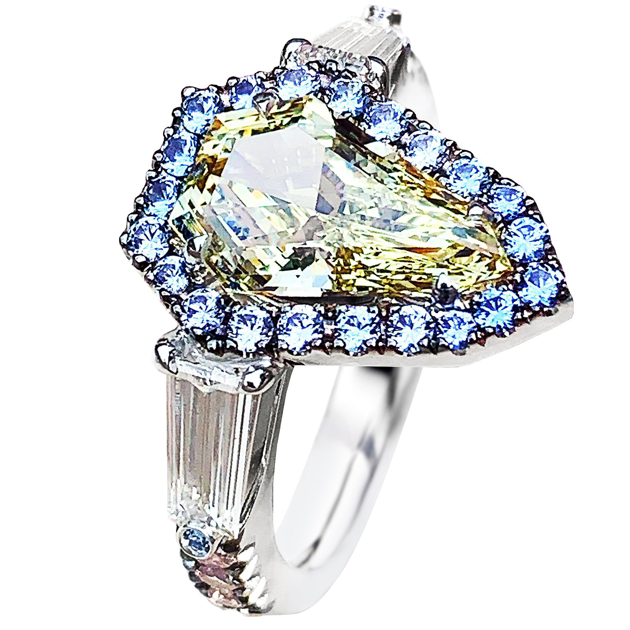 1.43 Ct. VVS2 GIA Fancy Yellow Shield Cut Diamond, Unheated Blue Sapphire Ring