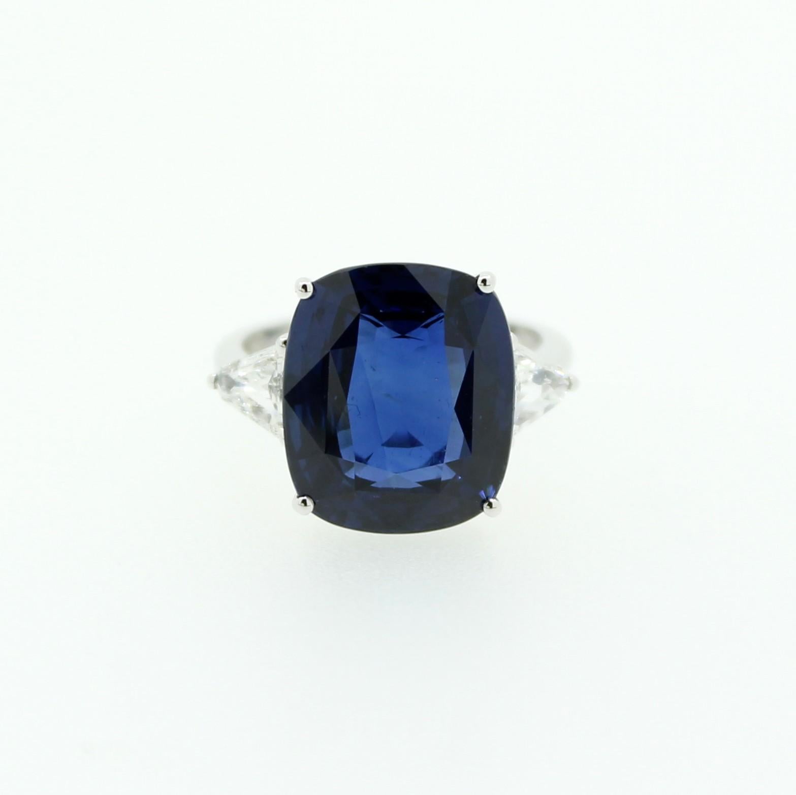 Contemporary 14.30 Carat Cushion Blue Sapphire and Side White Trillon Diamond Engagement Ring For Sale