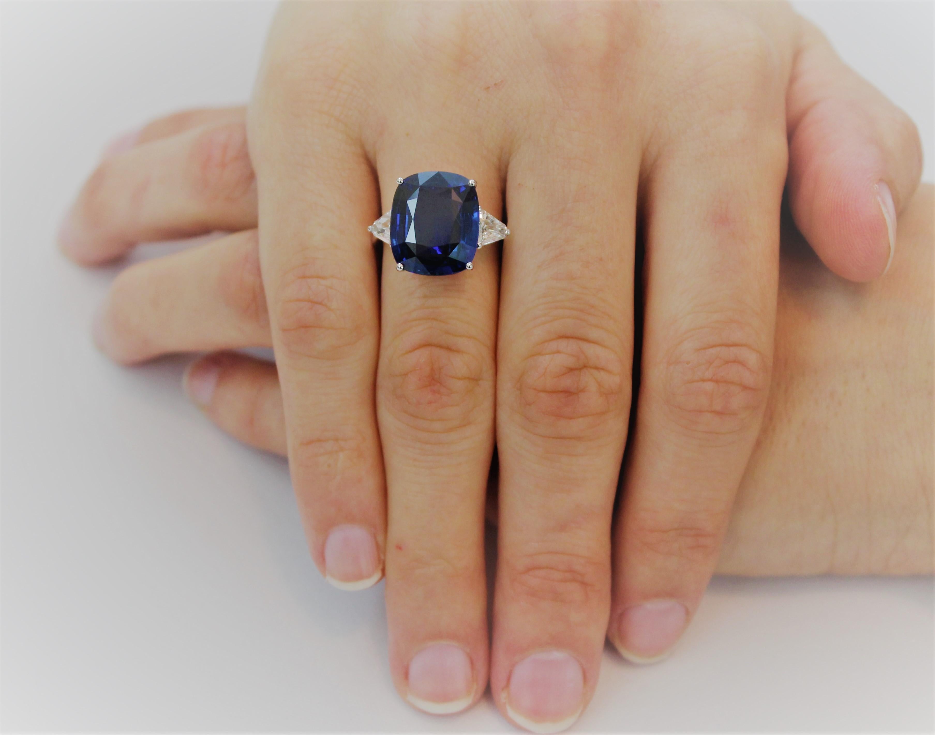 Women's 14.30 Carat Cushion Blue Sapphire and Side White Trillon Diamond Engagement Ring For Sale