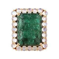 14.31 Carat Carved Emerald & Moon Stone Ring Studded in 18k Yellow Gold