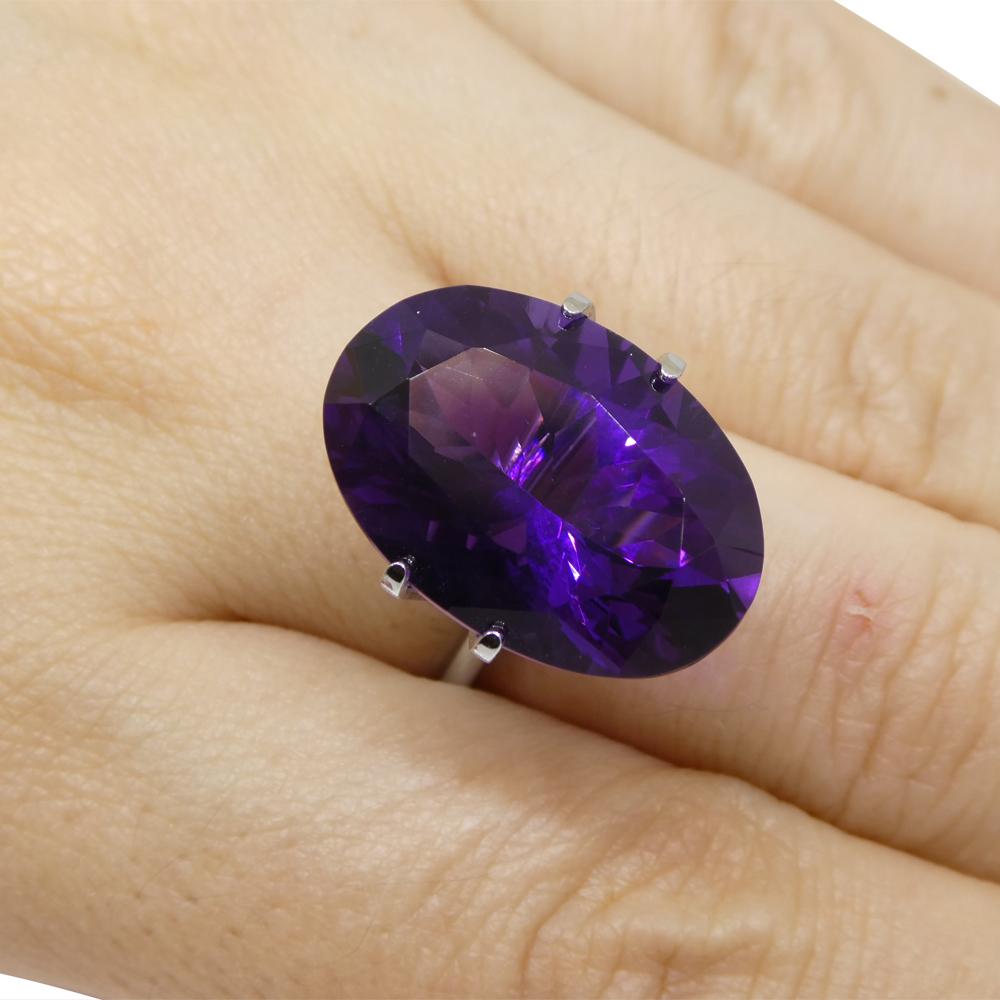 Description:

Gem Type: Amethyst
Number of Stones: 1
Weight: 14.32 cts
Measurements: 20.08 x 13.85 x 10.06 mm
Shape: Oval
Cutting Style:
Cutting Style Crown: Brilliant
Cutting Style Pavilion:
Transparency: Transparent
Clarity: Very Very Slightly