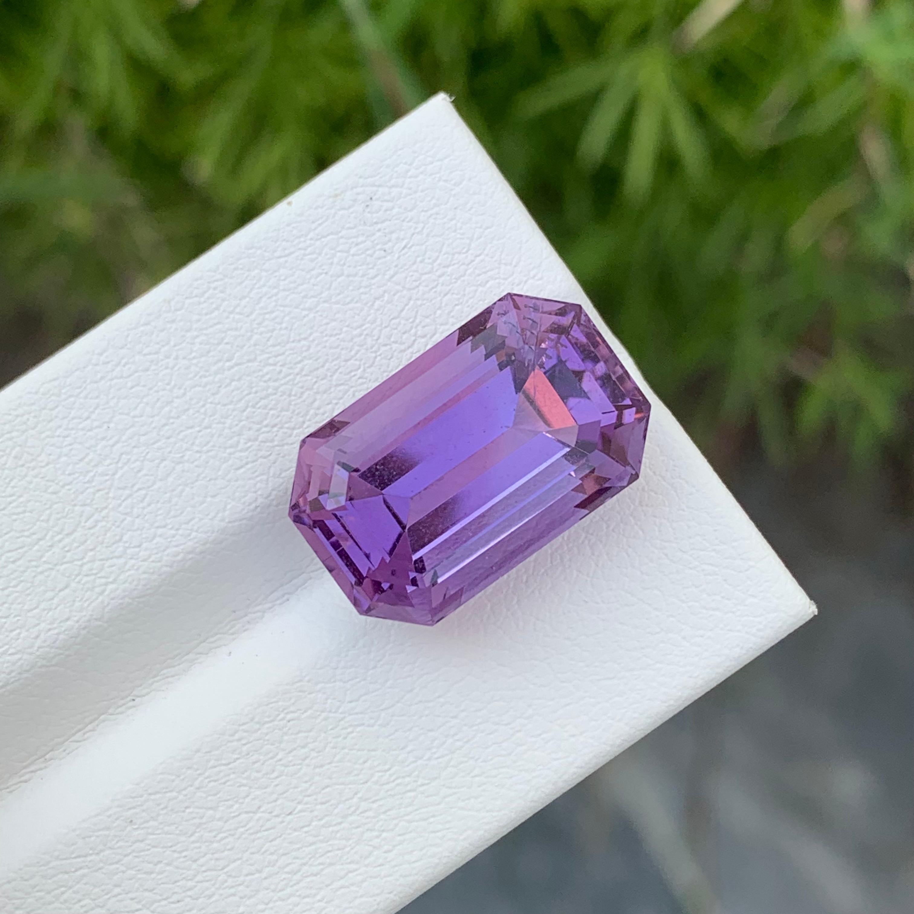 Loose Amethyst
Weight: 14.35 Carats
Dimension: 17.9 x 11.4 x 10 Mm
Colour: Purple
Origin: Brazil
Treatment: Non
Certificate: On Demand
Shape: Emerald 

Amethyst, a stunning variety of quartz known for its mesmerizing purple hue, has captivated