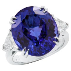 Anello a tre pietre con tanzanite e diamanti da 14,36 carati