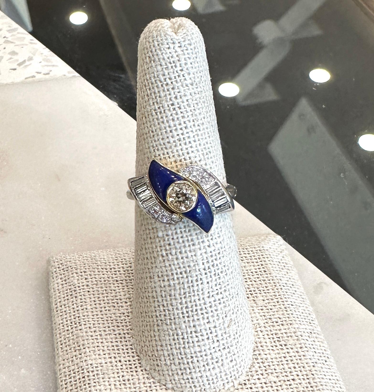 Vintage 1950's Platinum and 18KT Yellow Gold Ring
Beautiful .50ct  Round Old European Cut Center Diamond
J color  SI clarity
.93ct Brilliant Round & Baguette Cut Diamonds
Average F-G Color  VS-SI Clarity 
7.5 grams 
The Ring is Size 6.5 and Can be