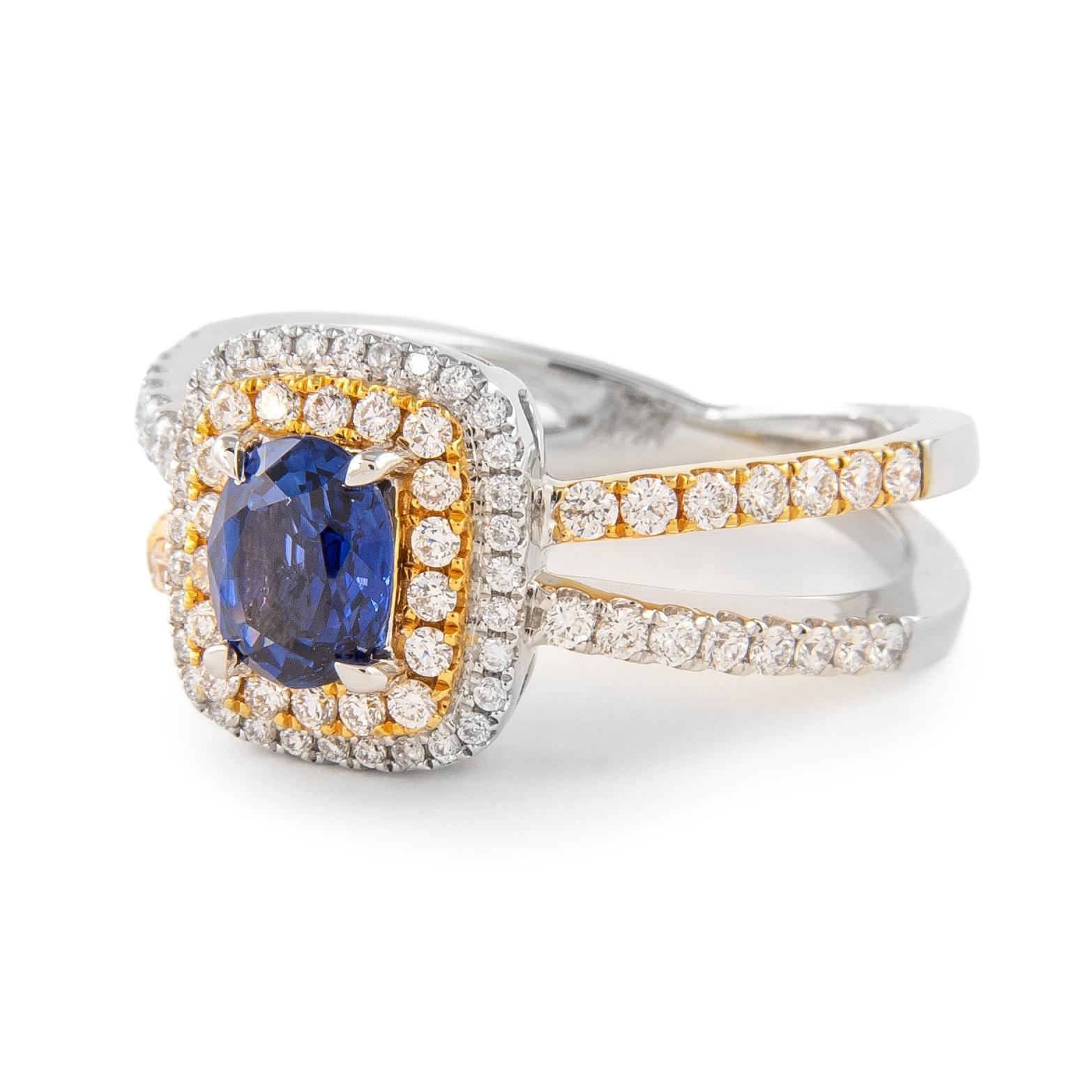 Beautiful sapphire and diamond halo ring.
1.43 carats total gemstone weight.
0.87 carat oval shape sapphire, heated. Complimented by 82 round brilliant diamonds, 0.56 carats, F/G color and VS2/SI1 clarity. 14k white and yellow gold, 5.91 grams,
