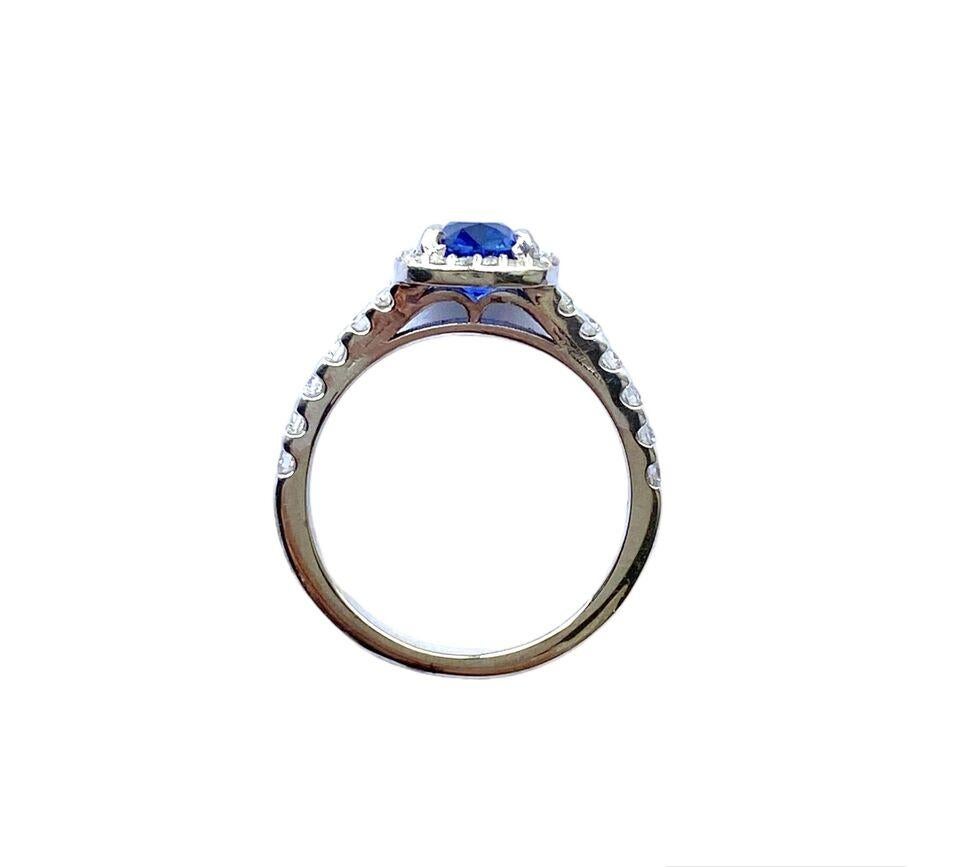 1.43ctw Blue Sapphire & Diamond Ring 14K White Gold 2.2G
Main stone: 1.15ct Blue Sapphire
Measures 5.5x6mm
Side stones: 0.28ctw Diamonds
Diamonds quality: G/SI1
Setting style: Halo
Ring size: 5.5US
Weight: 2.2G
Metal: 14K White Gold
Hallmark: 14K