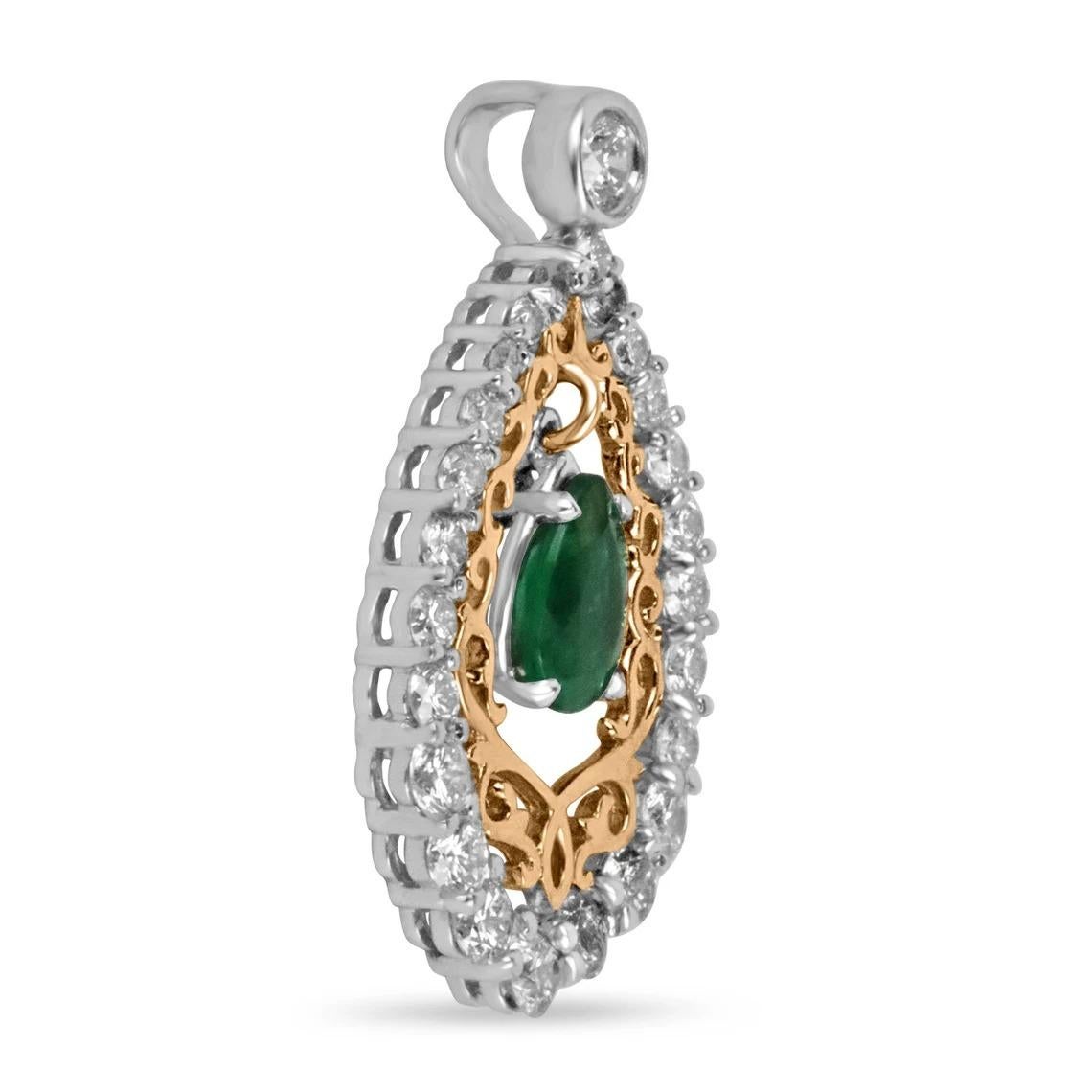 A spectacular 1.43tcw emerald and diamond halo pendant. Crafted in two-toned gold. The center gemstone is floating among stunning diamonds. The earth-mined emerald is handset in a secure four-prong setting. This gem has deep green color and is eye