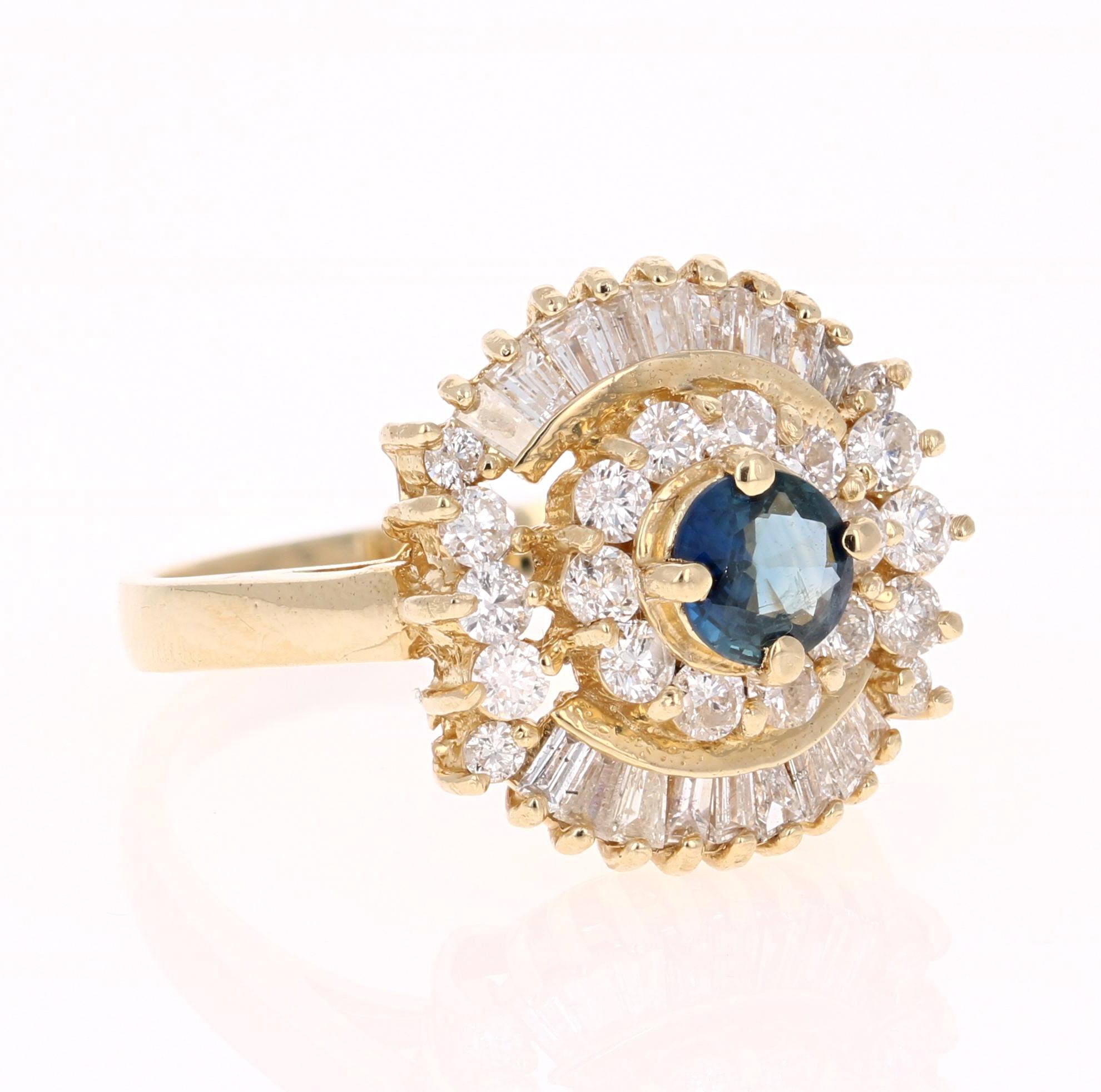 Charming Ballerina Sapphire Diamond Ring. 

This ring has a round cut Blue Sapphire weighing 0.45 Carats. It is embellished with 20 Round Cut Diamonds weighing 0.64 Carats and 18 Baguette Cut Diamonds weighing 0.35 Carats. The total carat weight of