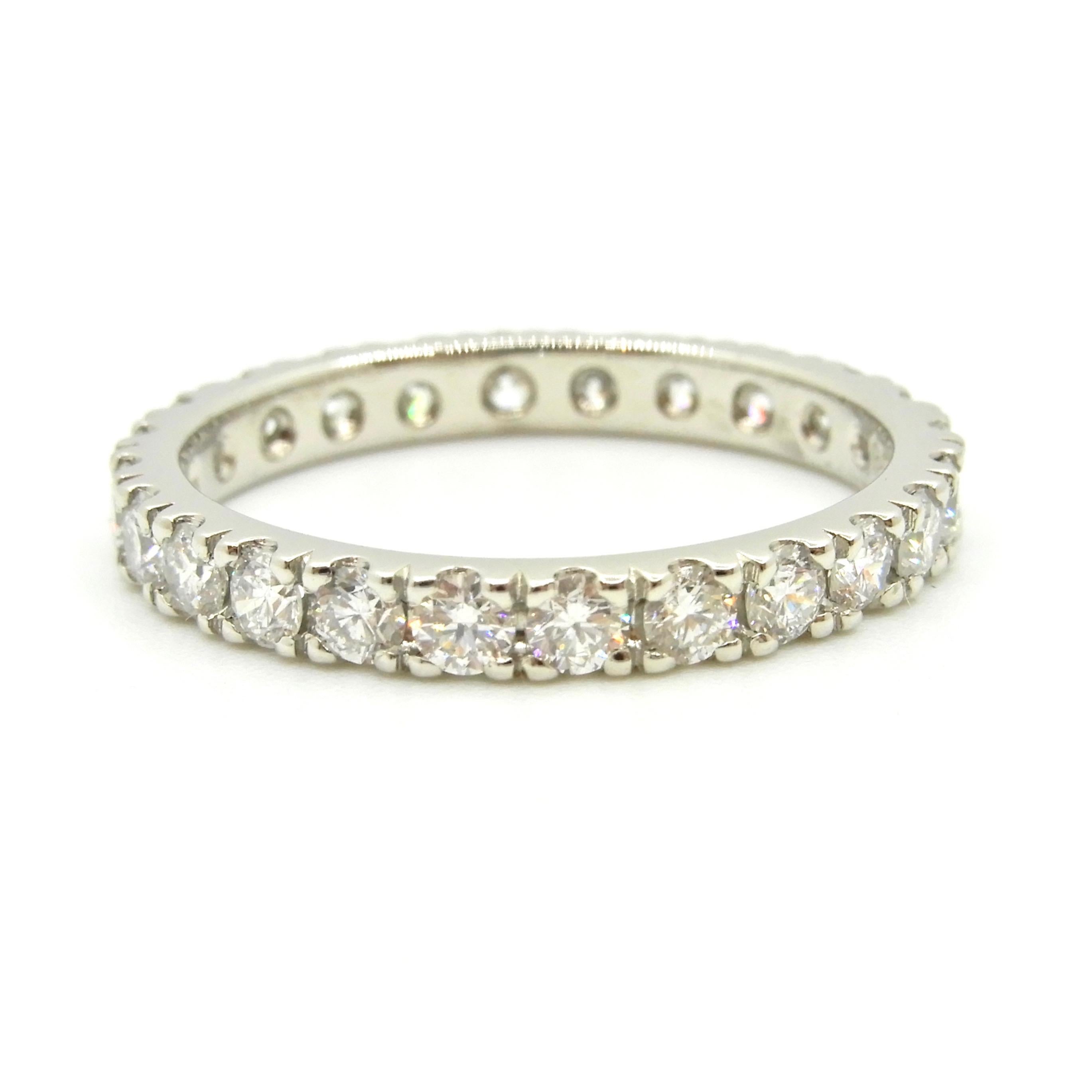 This stunning 1.44 carat diamond and platinum full eternity band ring is scallop claw set. It features 24 x 2.5mm round brilliant cut Diamonds of G colour SI clarity. The infinity ring is the perfect wedding ring, celebration ring or eternity