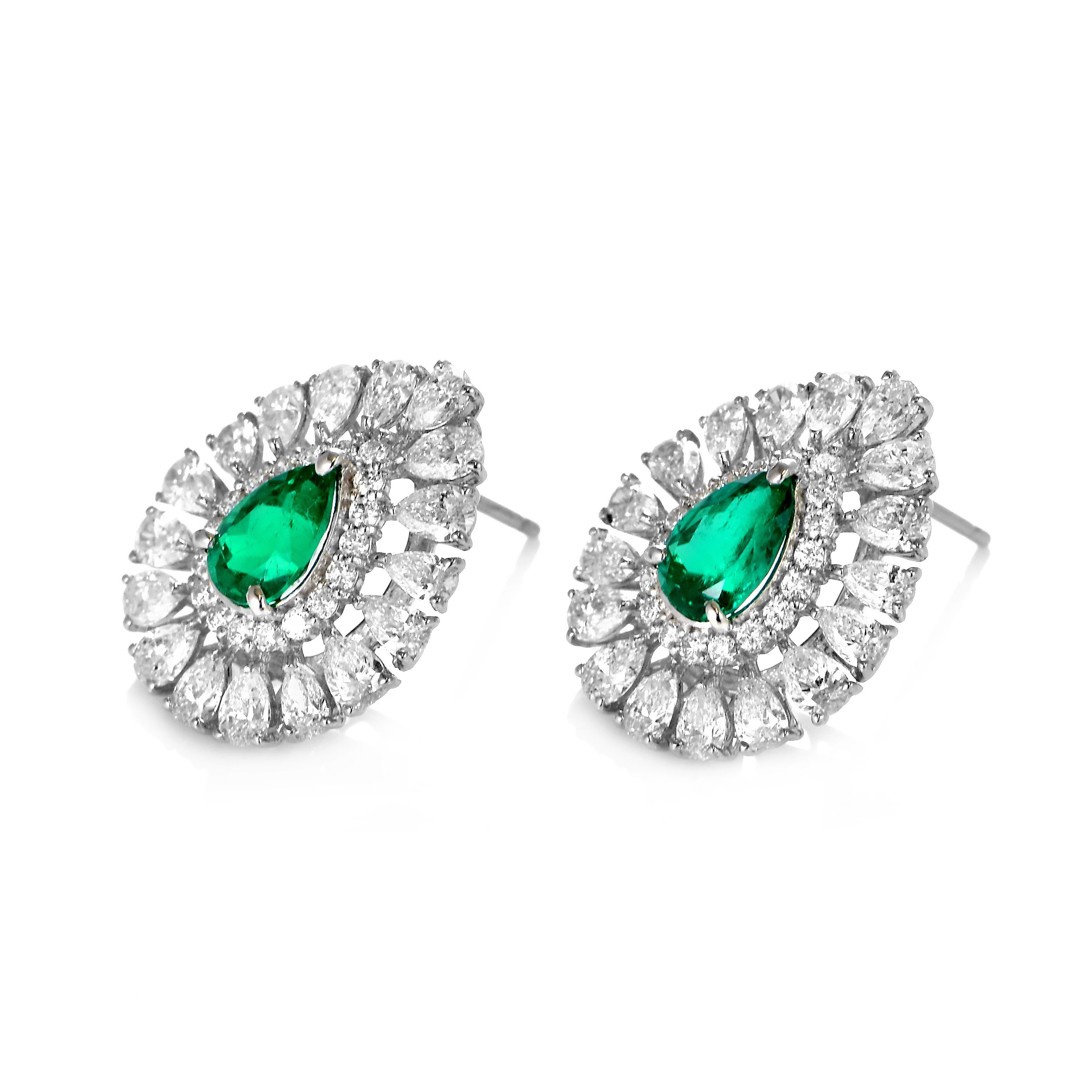 A stunning pair of pierced earring featuring a total of 1.44 Carats Natural Colombian Emeralds and 2.72 Carats of Diamond Accents set in Platinum. People have admired emerald’s green for thousands of years. Emeralds have always been associated with