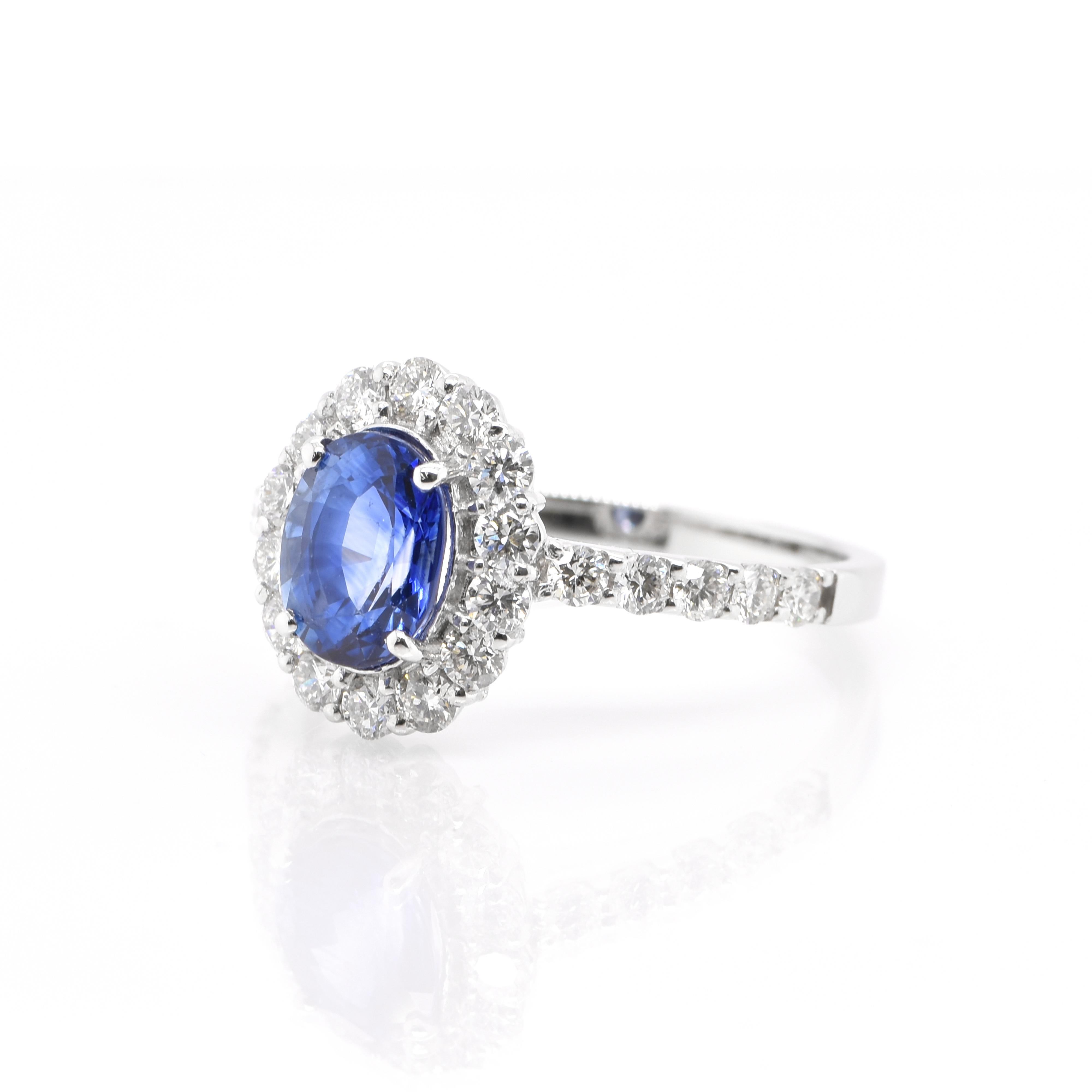 A beautiful Engagement Ring featuring a 1.44 Carat, Natural, Blue Sapphire and 0.67 Carats of Diamond Accents set in Platinum. Sapphires have extraordinary durability - they excel in hardness as well as toughness and durability making them very
