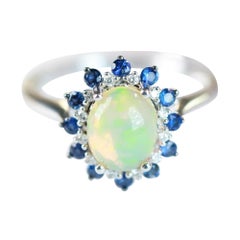 1,44 Karat Oval Cab Äthiopischer Opal Blauer Saphir und Diamant 10K Weißgold Ring