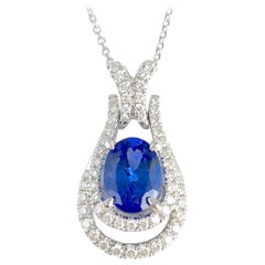 DiamondTown 1.44 Carat Oval Cut Vivid Blue Tanzanite and Diamond Pendant