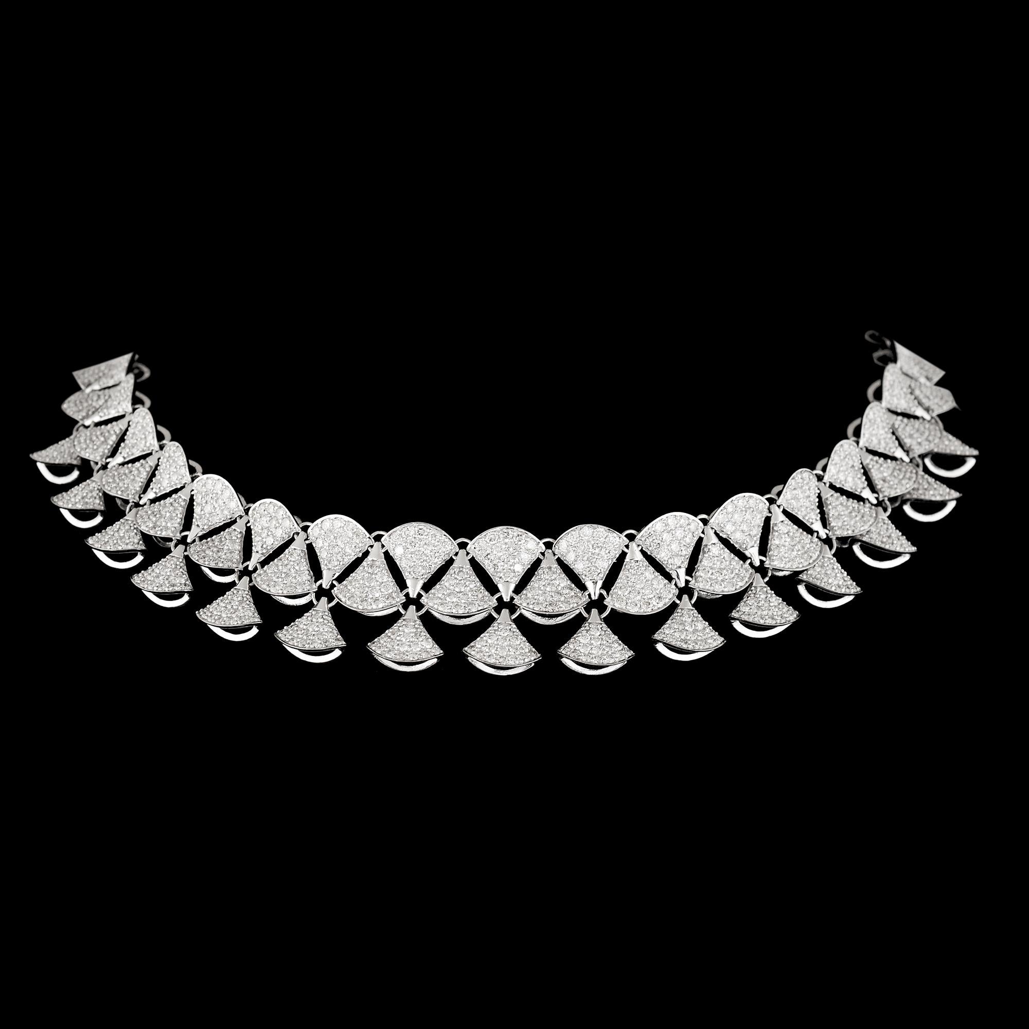 This necklace is designed to make a statement and exude timeless elegance. It delicately drapes around the neck, accentuating the neckline and adding a touch of glamour to any ensemble. Whether worn for a special occasion or as a luxurious everyday