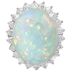 Bague en or blanc massif 14 carats avec opale naturelle et diamant 