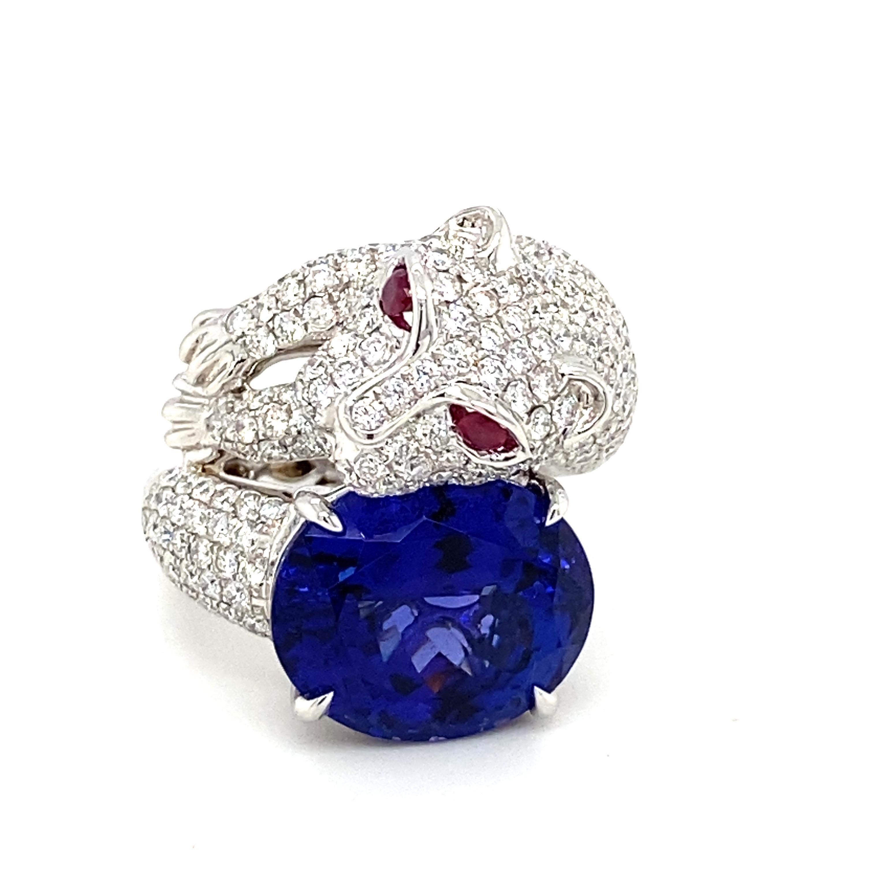 White Gold panther ring is set with brilliant cut diamonds. The panther is holding an oval tanzanite and eyes are ruby. Meticulously crafted to embody a genuine masterpiece.
Tanzanite: 14.44 carat
Diamond & Ruby: 3.92 carat
Gold: 18K White
Size: 7