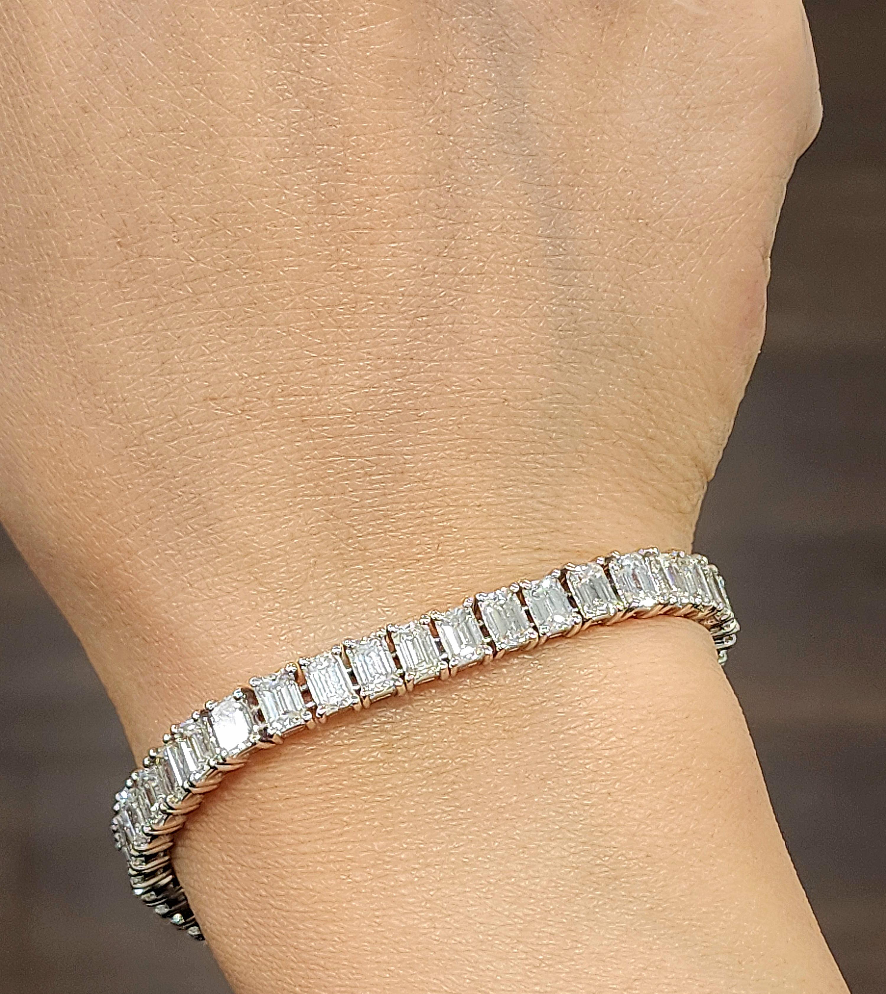 This stunning emerald cut diamond tennis bracelet is a head turner. The bracelet boasts 48 emeralds showcasing a color of G/H and VS1+ in clarity. A gorgeous bracelet to add to any wardrobe.