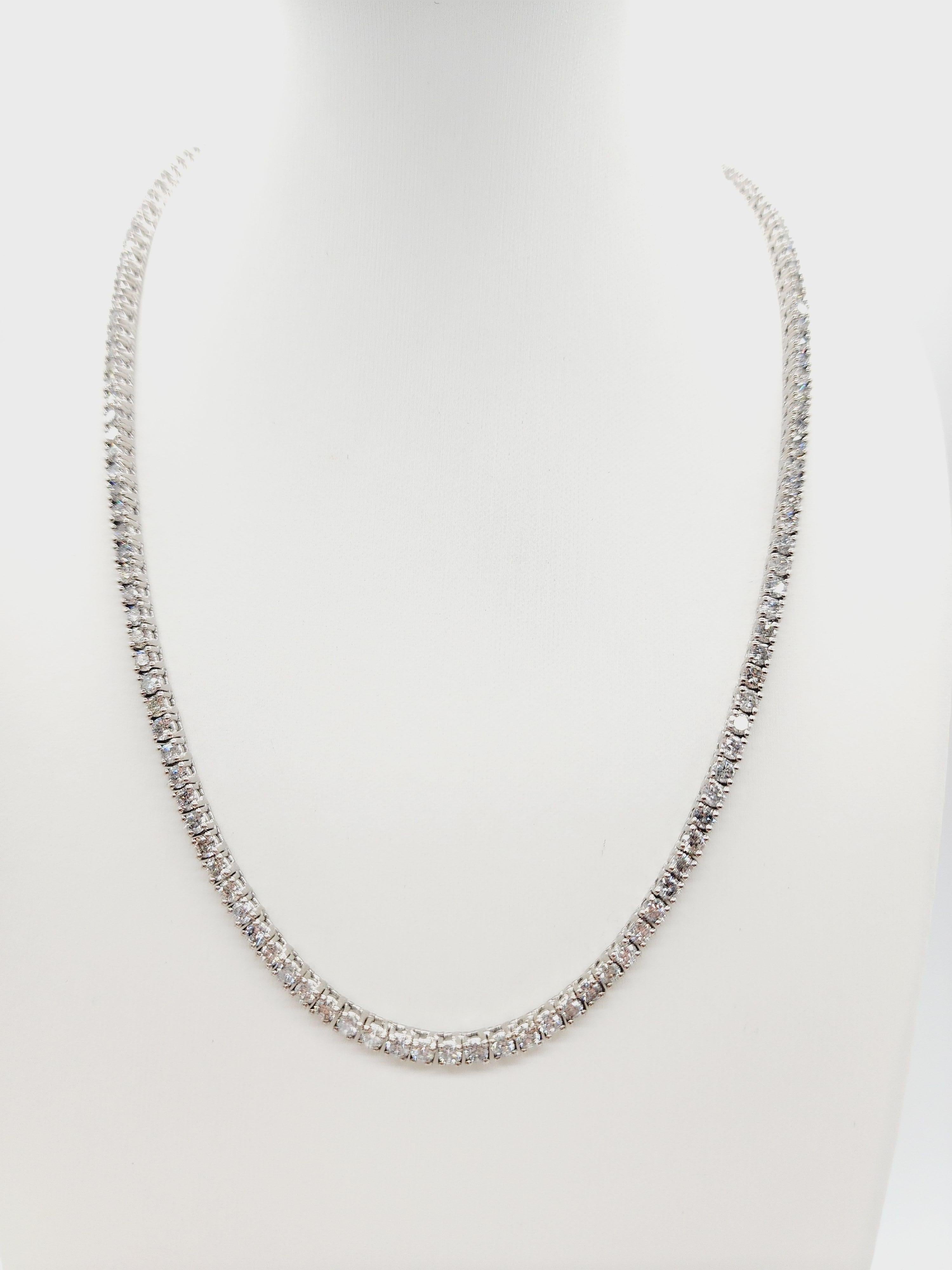 Beautiful quality tennis necklace, round-brilliant cut white diamonds clean and excellent shine!

Carat Weight: 14.45 cts
14k solid white gold
Style: Classic four-prong style for maximum light brilliance. Length: 18 inch 
Average Color: G
Average