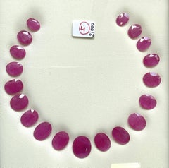 144.90 carats ruby Mozambique cut stone oval 19 Pieces layout heated natural gem