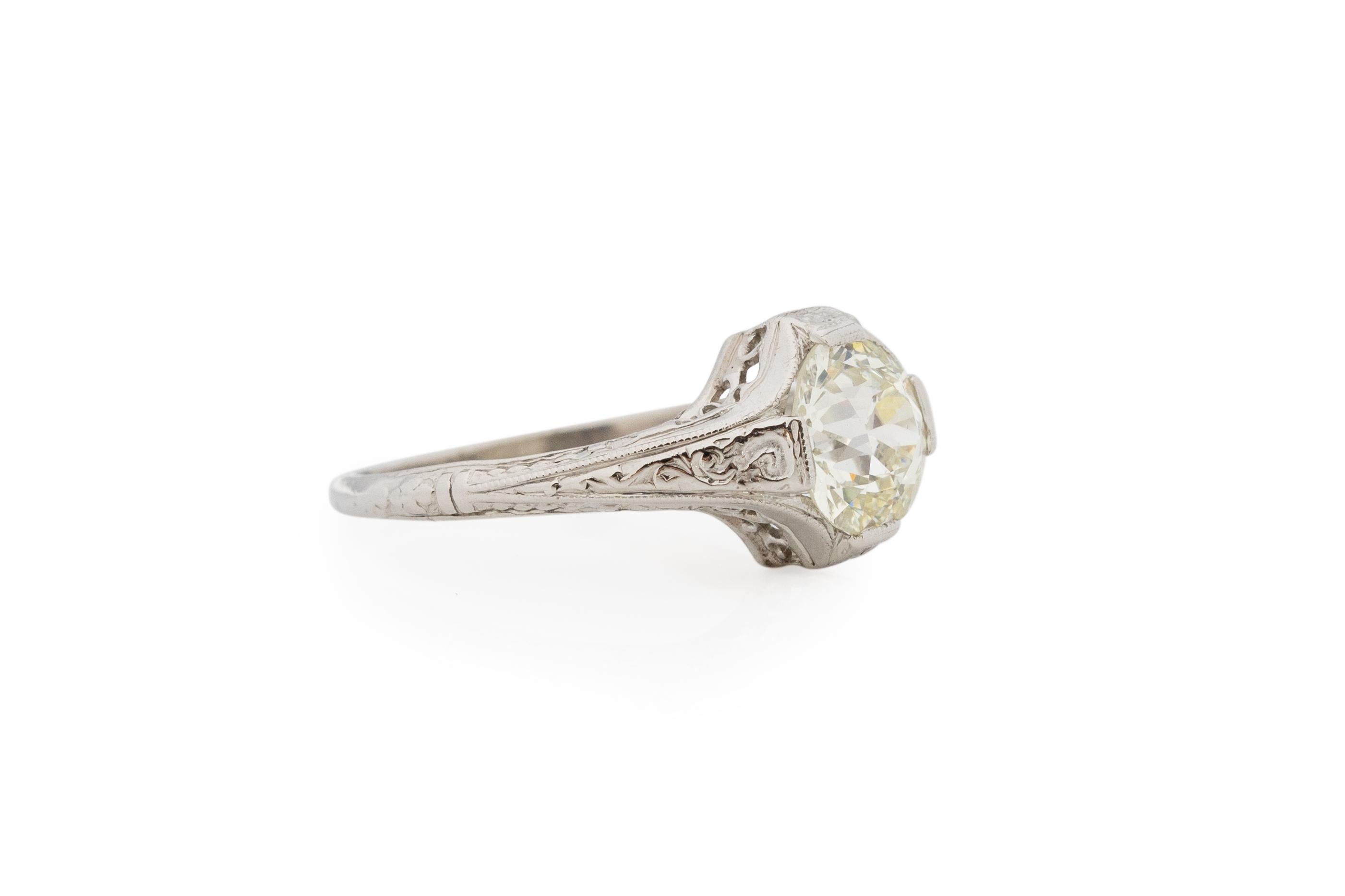Ring Size: 6.5
Metal Type: Platinum [Hallmarked, and Tested]
Weight: 2.6 grams

Center Diamond Details:
Weight: 1.45 carat
Cut: Old European brilliant
Color: O/P Light Yellow
Clarity: VS2

Finger to Top of Stone Measurement: 5.5mm
Condition:
