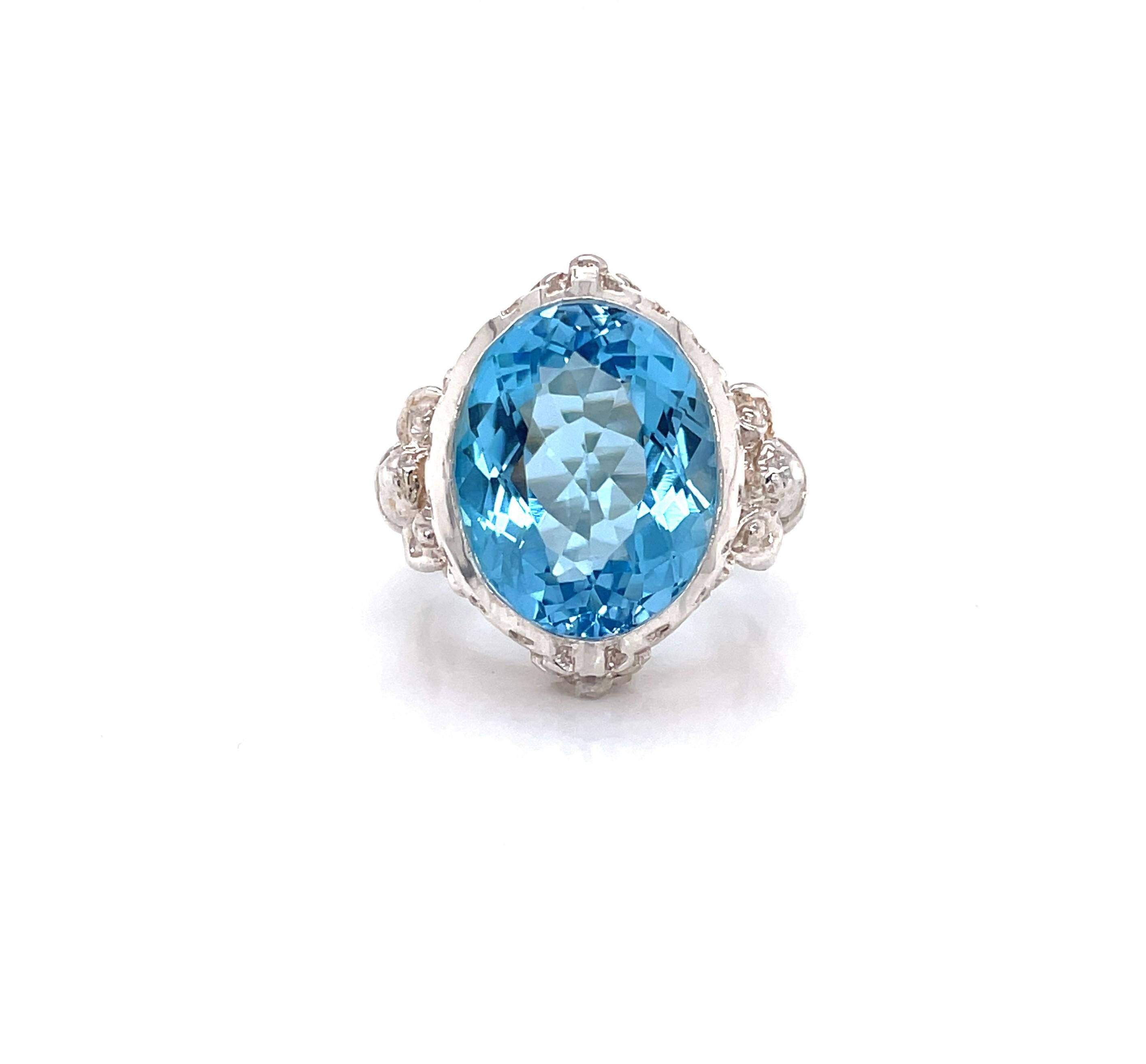 Oval Cut 14.5 Carat Blue Topaz Sterling Silver Cocktail Ring For Sale