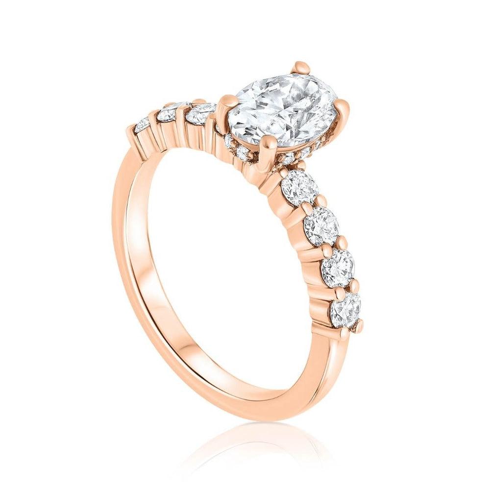 1.45 Carat EGL Certified Oval Diamond Ring in 14 Karat Rose Gold - Shlomit Rogel

Dripping in luxury, this beautiful solitaire ring was designed to be bold. Handcrafted from 14k rose gold, this classic oval engagement ring features a prong set 1.00